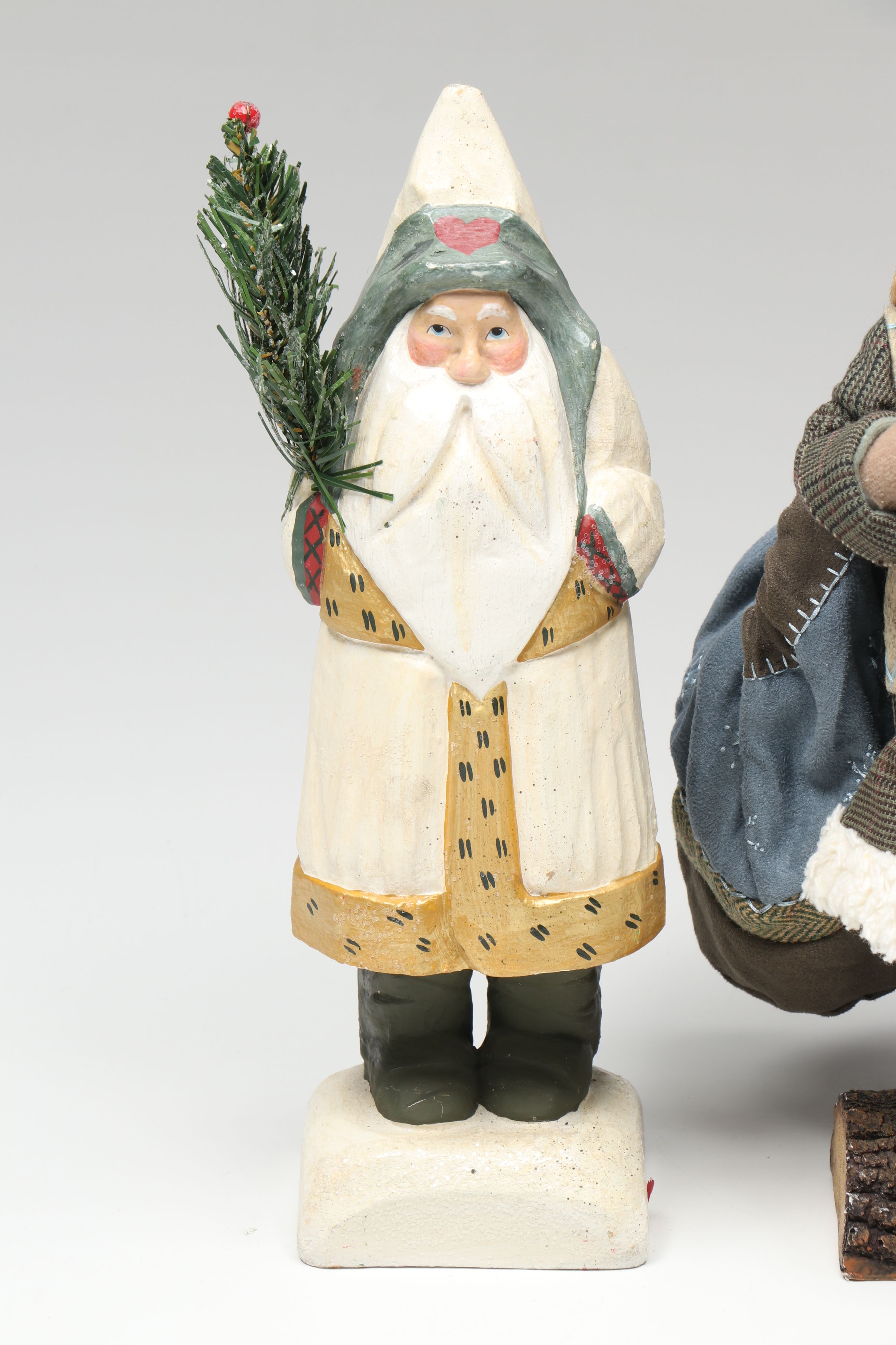 St. Nicholas Square and Other Resin Santa Claus Figurines