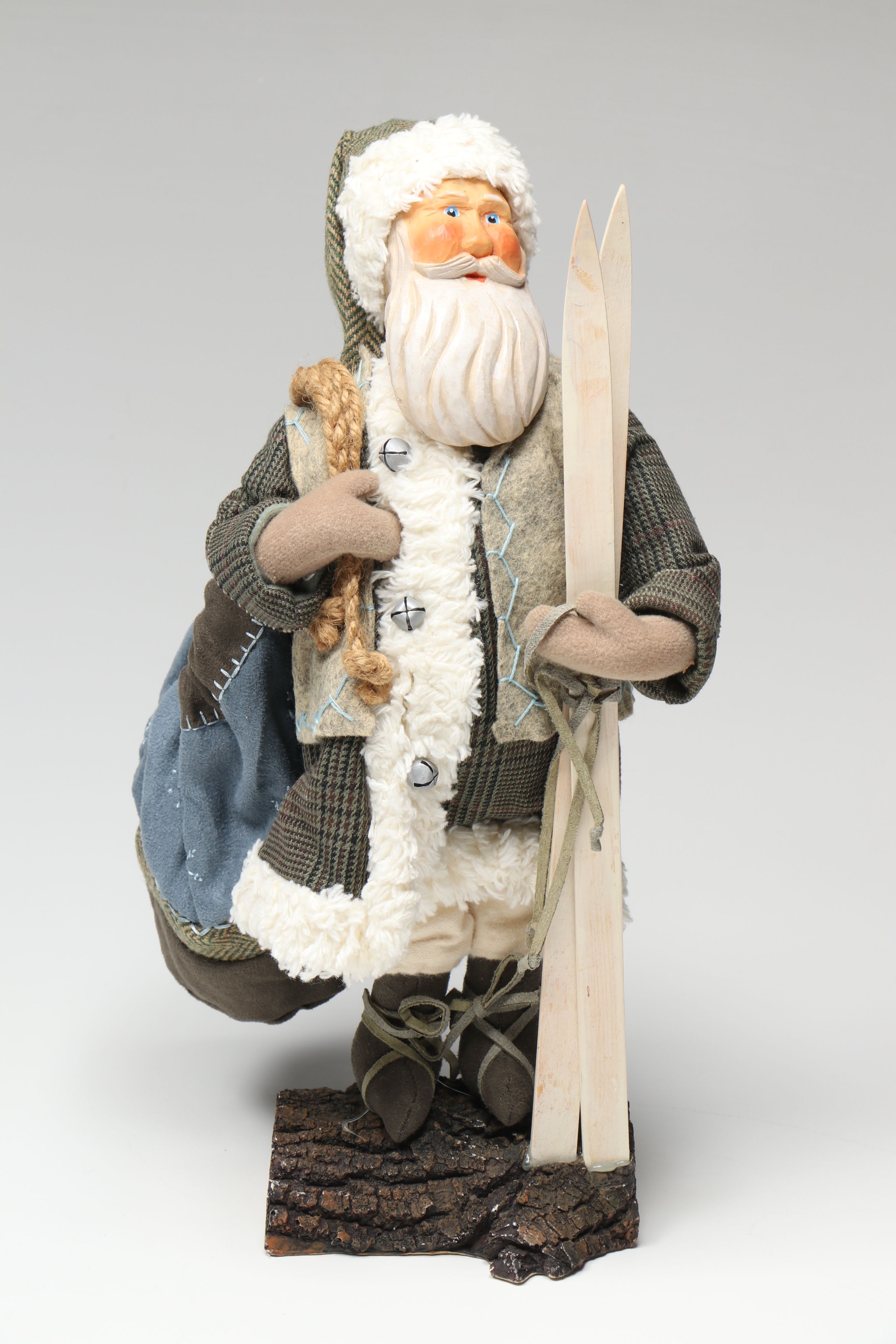 St. Nicholas Square and Other Resin Santa Claus Figurines