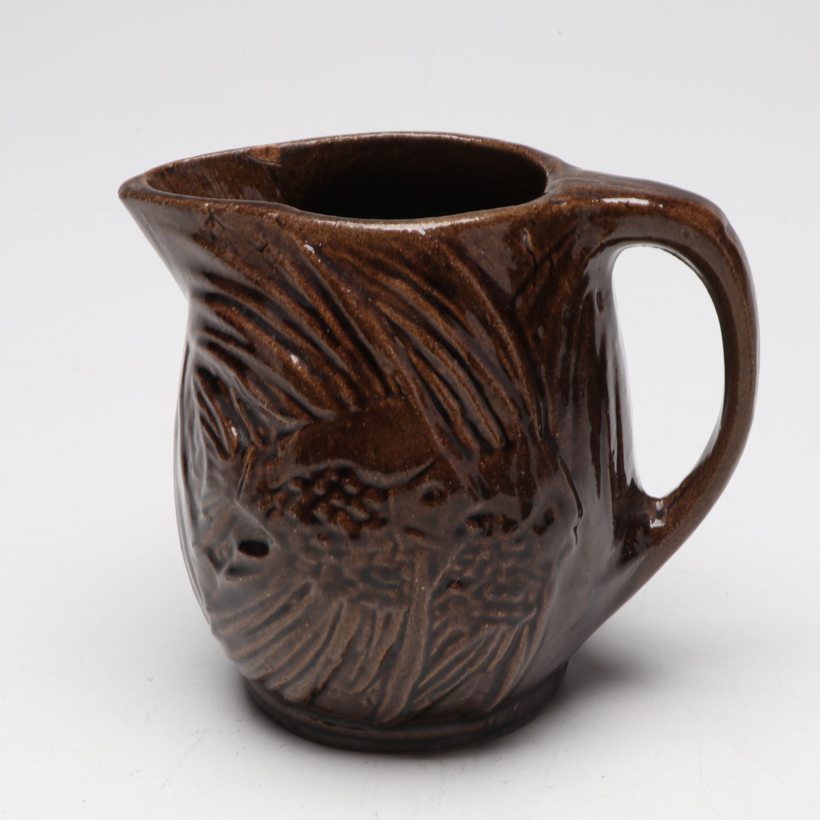 McCoy Pottery Botanical and Aquatic Brown Pitchers with Ribbed Hull Creamer