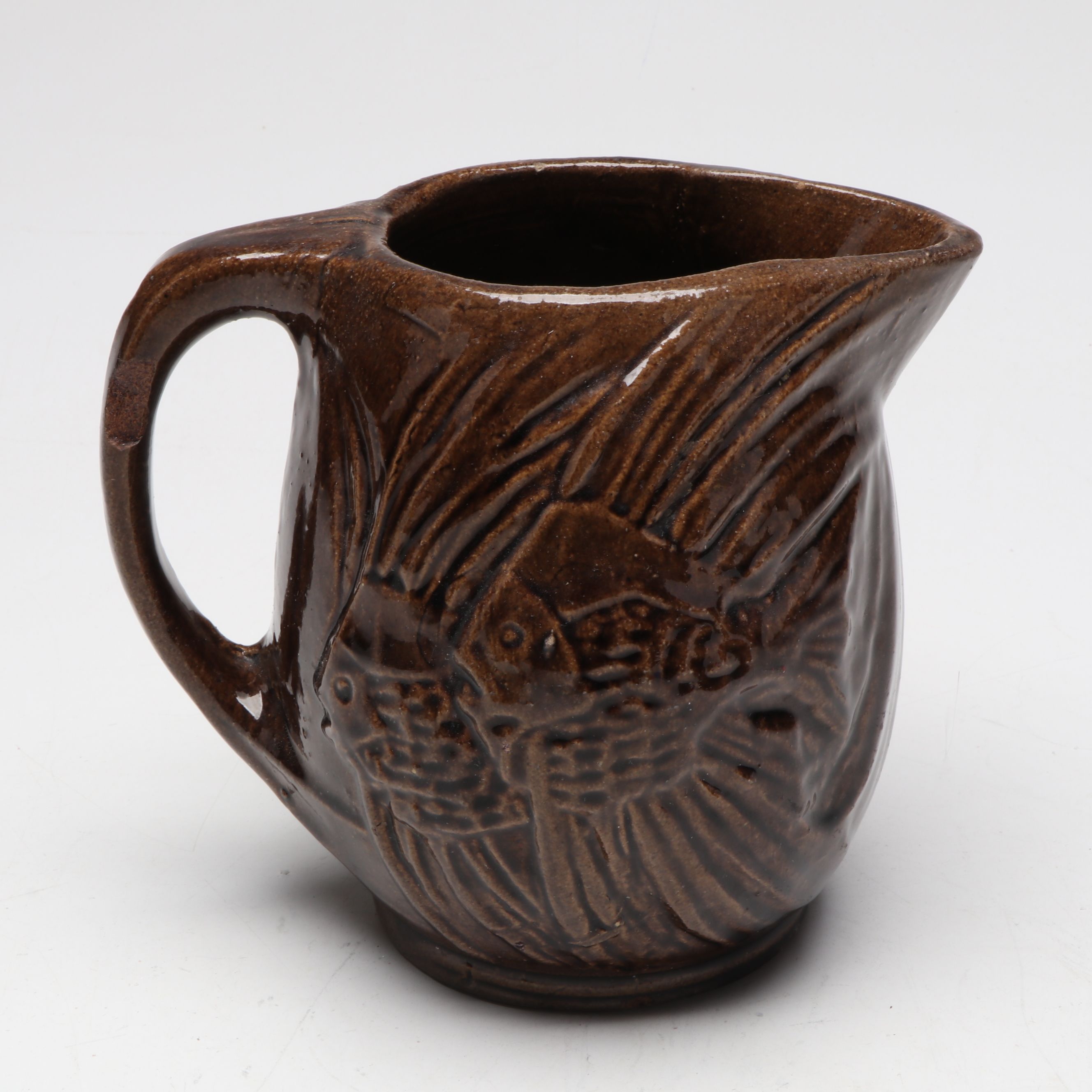 McCoy Pottery Botanical and Aquatic Brown Pitchers with Ribbed Hull Creamer