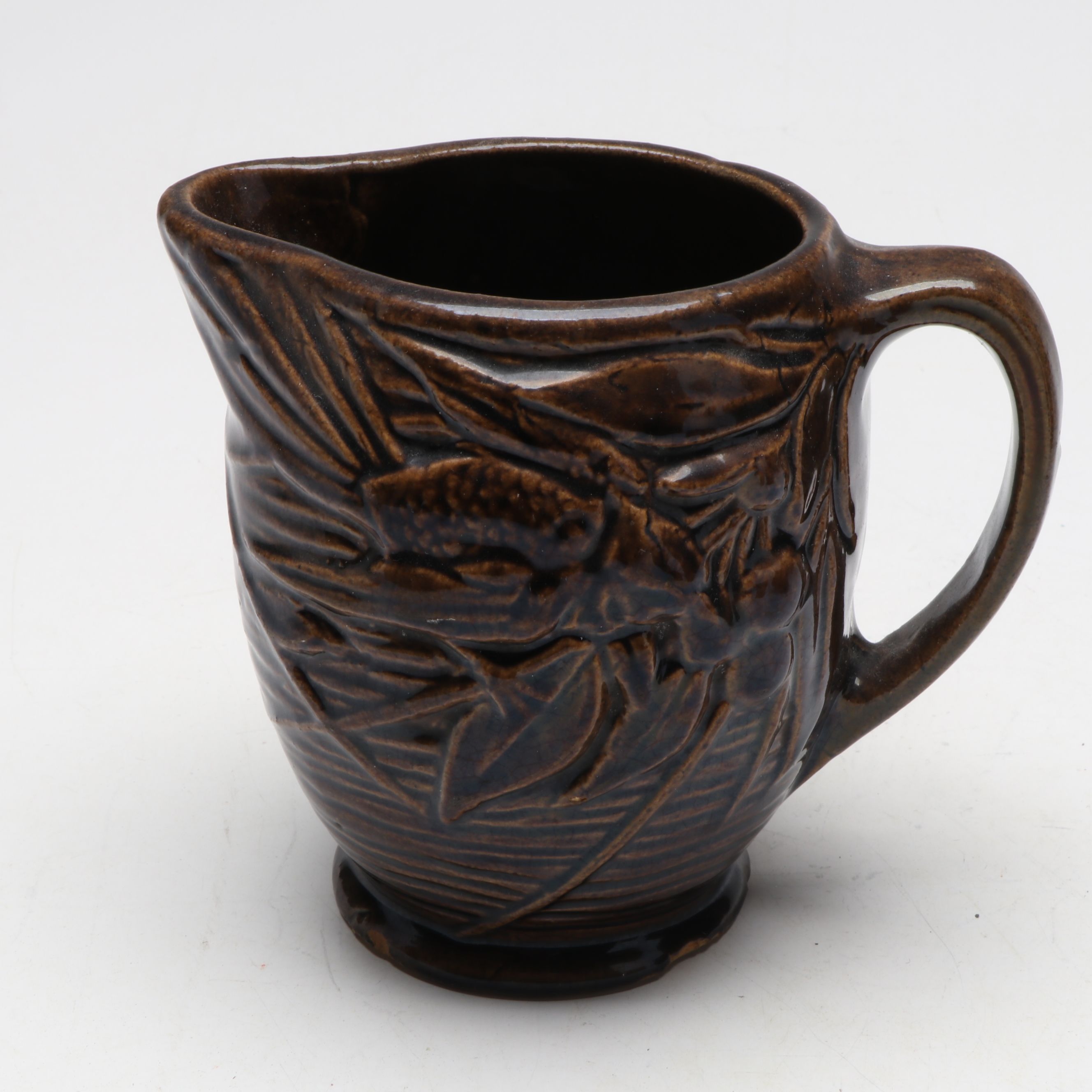 McCoy Pottery Botanical and Aquatic Brown Pitchers with Ribbed Hull Creamer