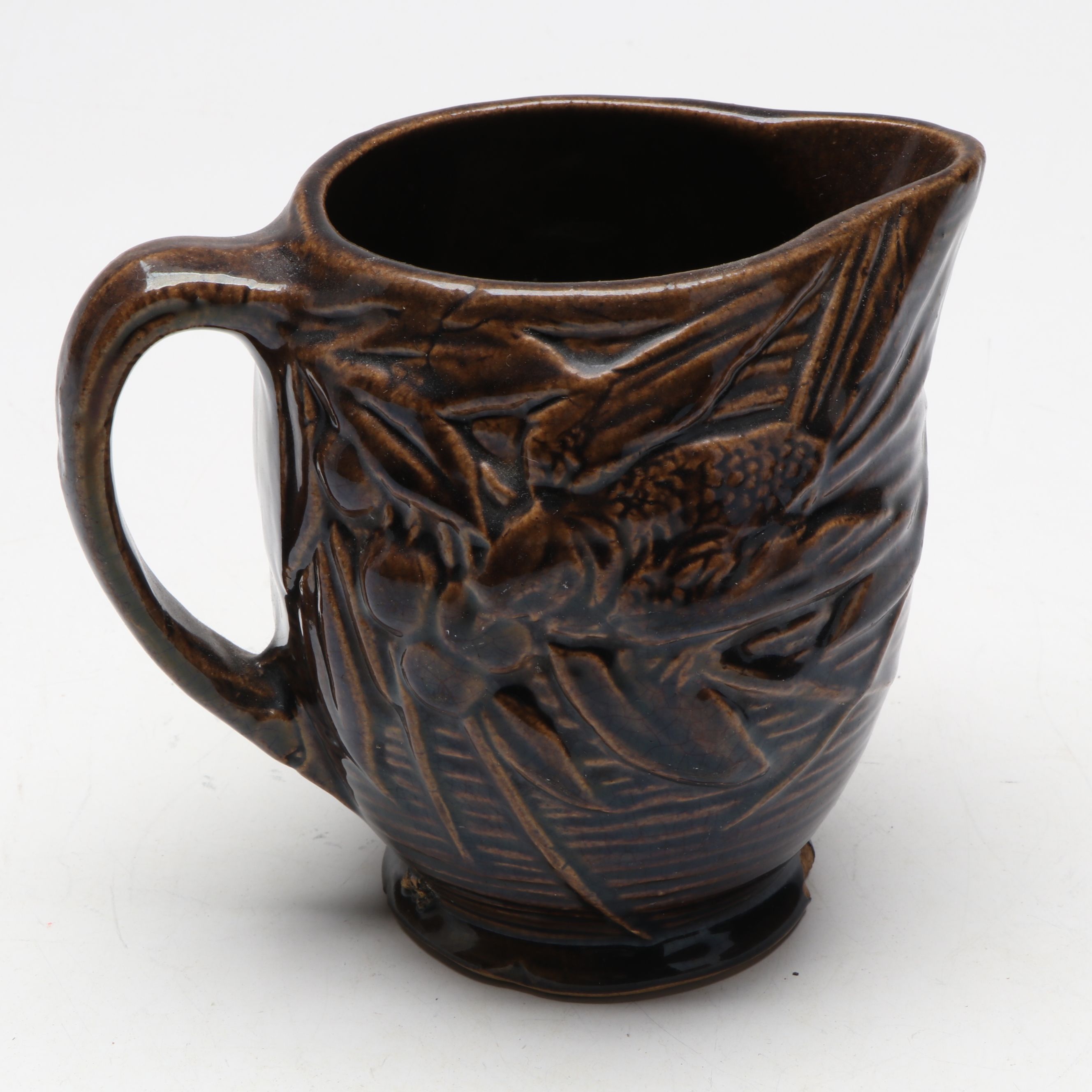 McCoy Pottery Botanical and Aquatic Brown Pitchers with Ribbed Hull Creamer