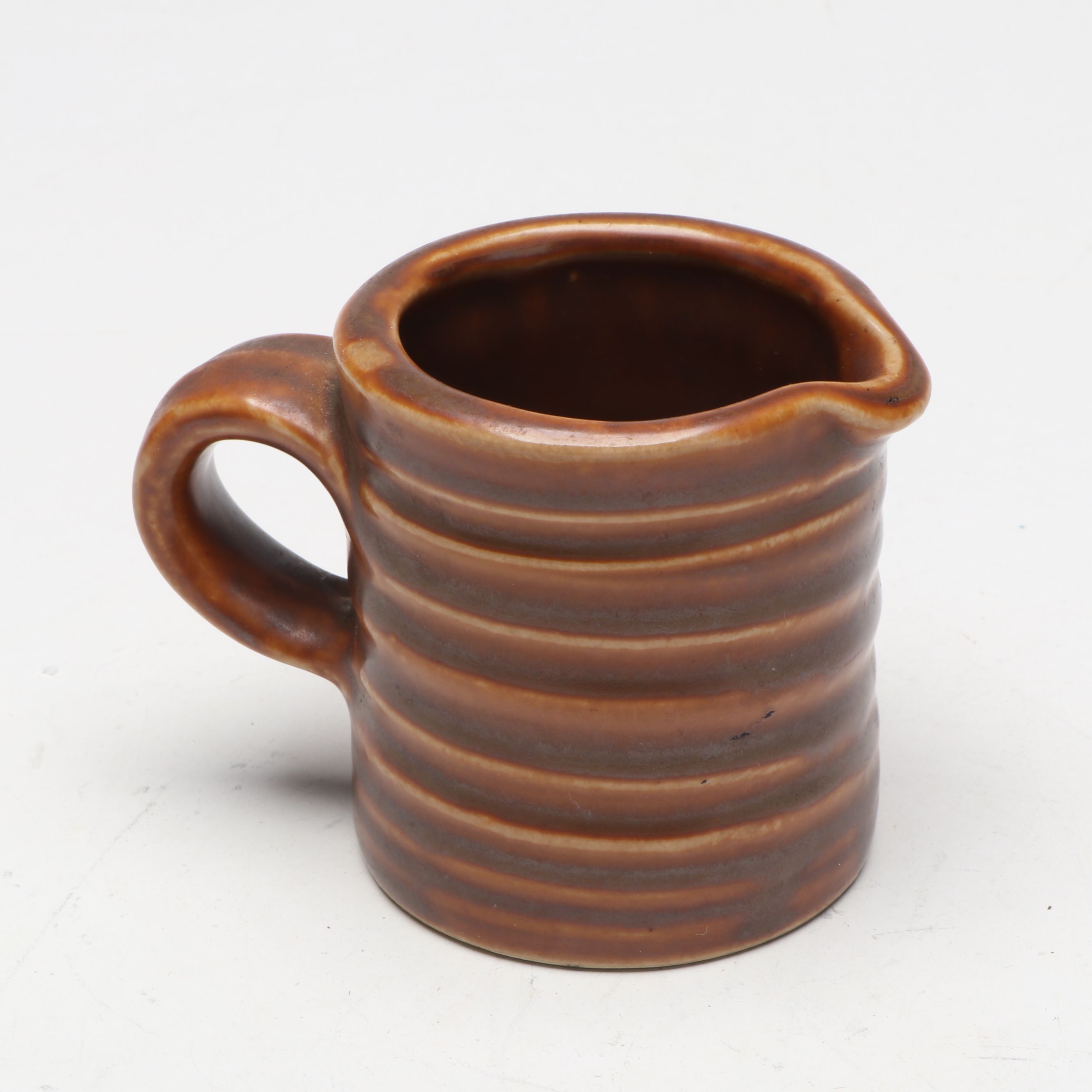 McCoy Pottery Botanical and Aquatic Brown Pitchers with Ribbed Hull Creamer
