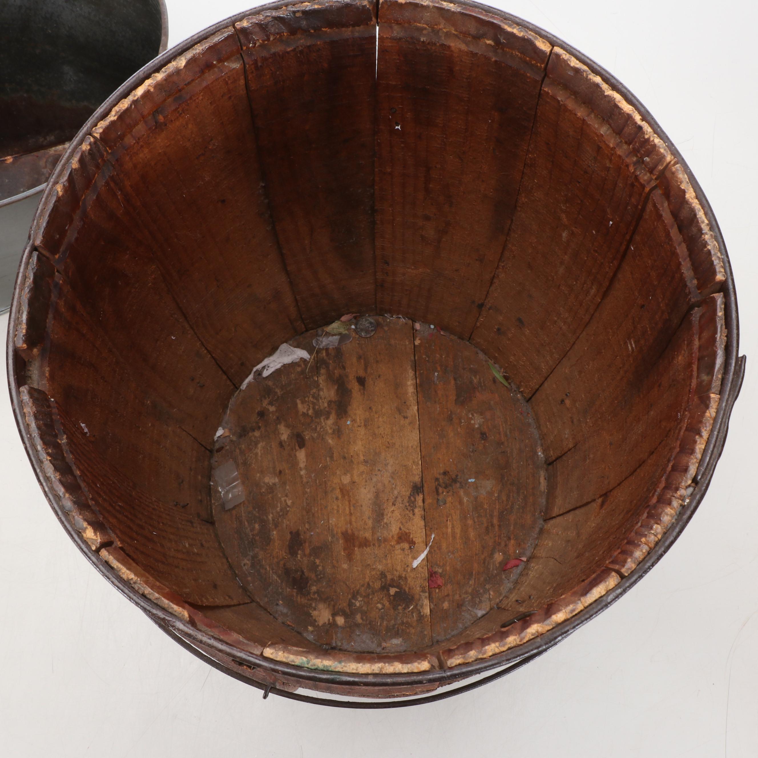 Wooden Barrel, Metal Planter, Woven Baskets, and Decorative Fruit