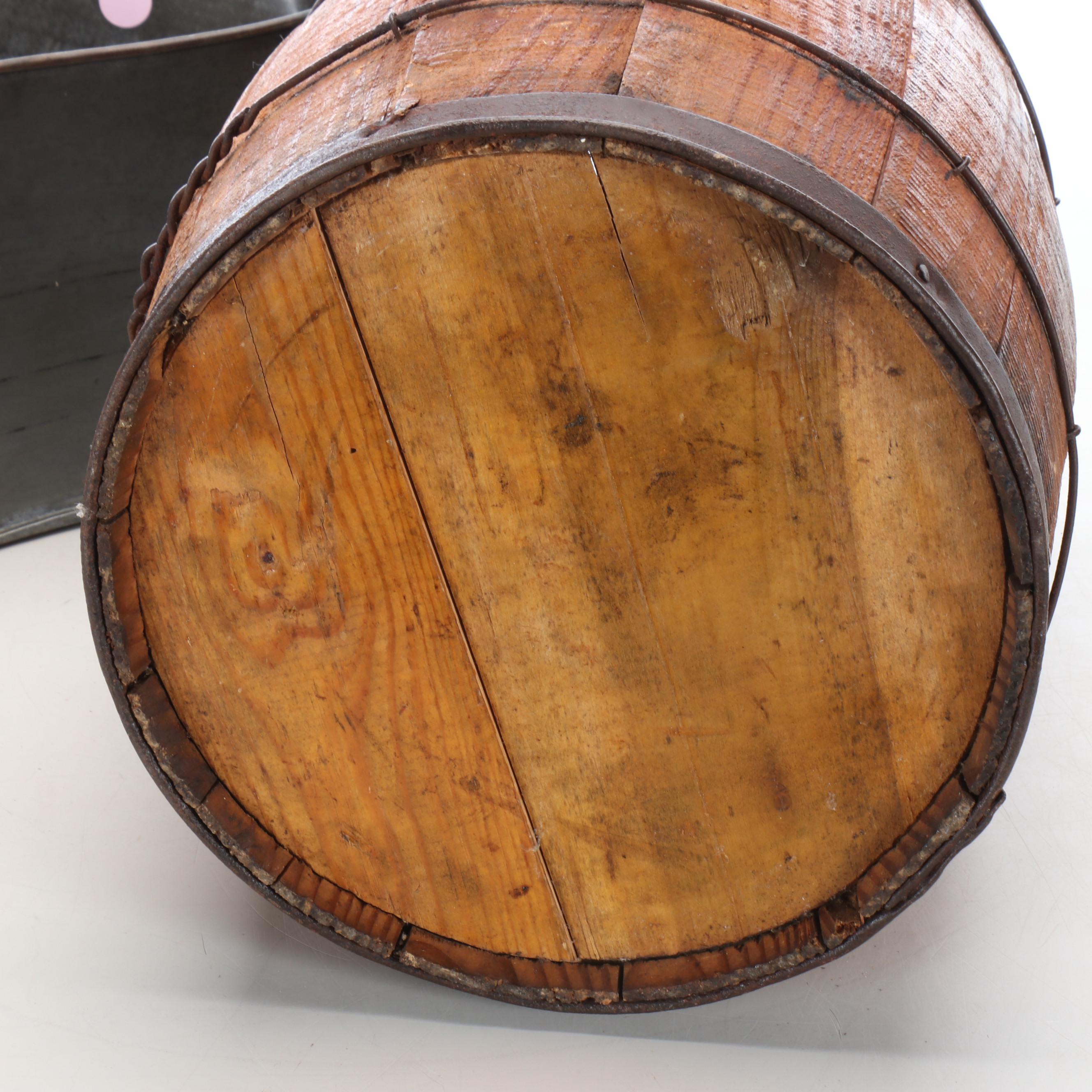 Wooden Barrel, Metal Planter, Woven Baskets, and Decorative Fruit