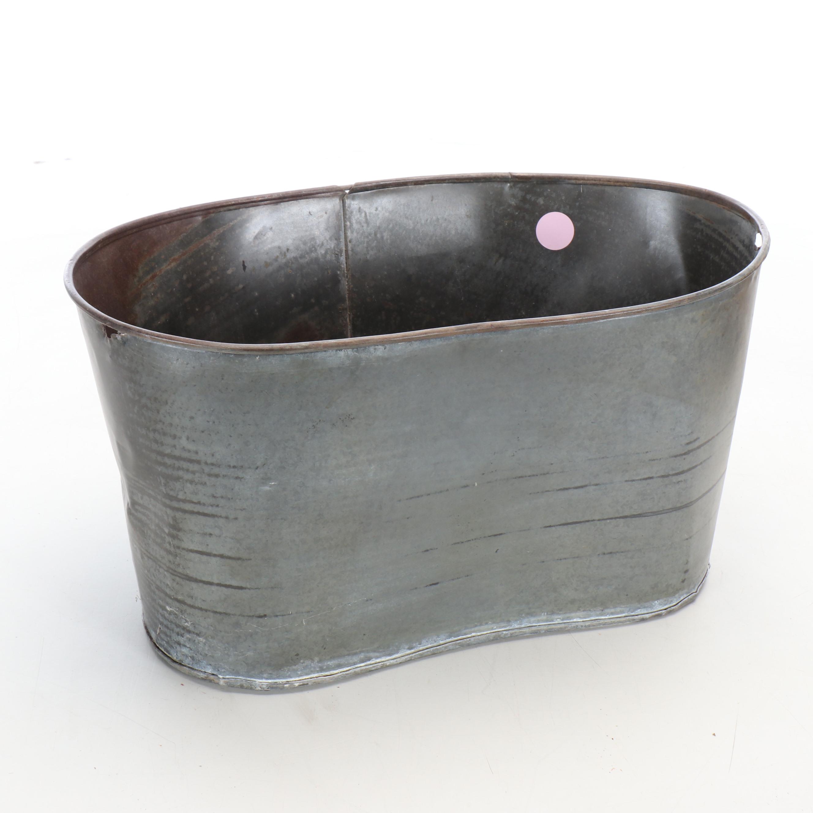 Wooden Barrel, Metal Planter, Woven Baskets, and Decorative Fruit