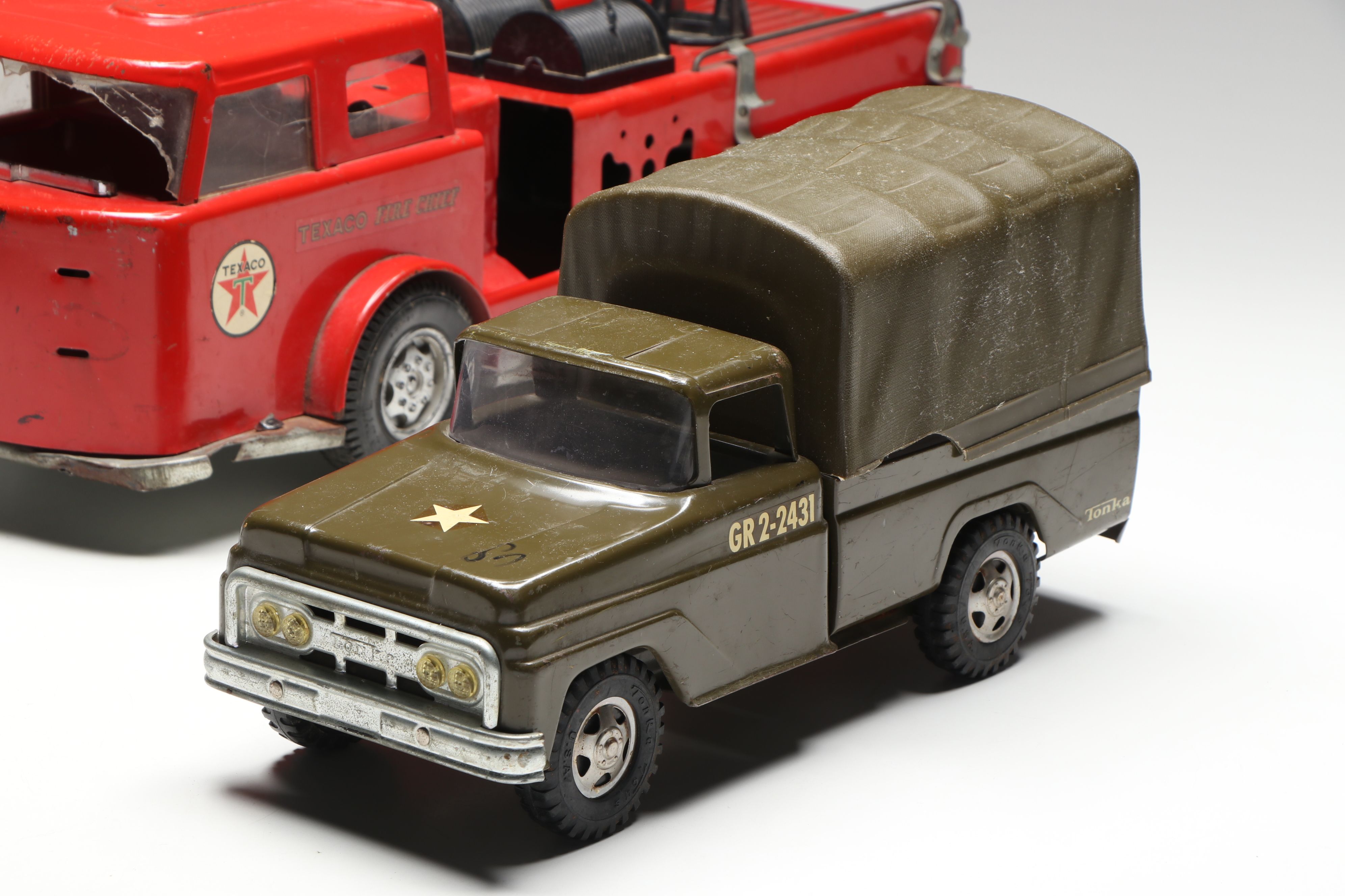 Buddy L "Texaco Fire Chief Truck" and Tonka Covered Military Toy Truck, 1960s