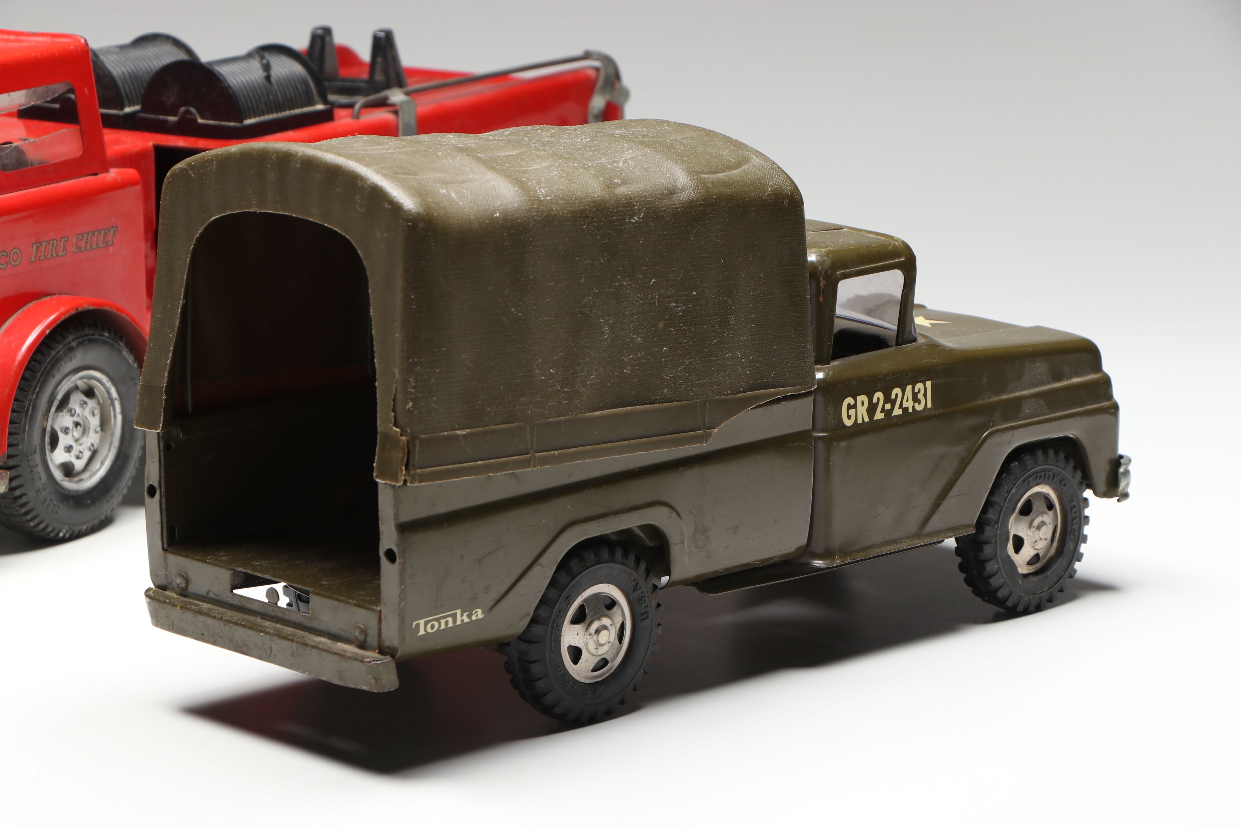 Buddy L "Texaco Fire Chief Truck" and Tonka Covered Military Toy Truck, 1960s