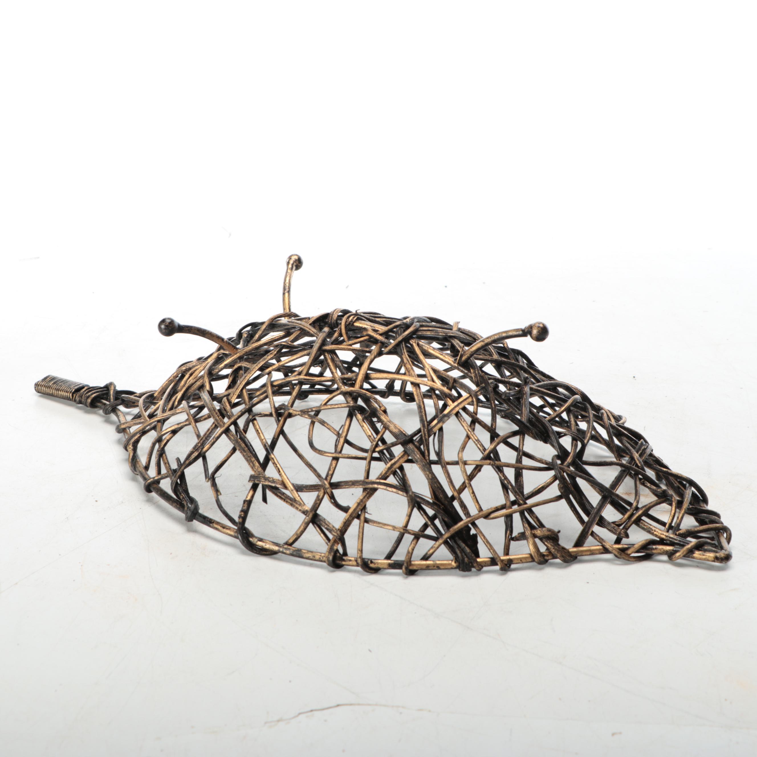 Antiqued Wire Bowl with Green Floral Vase and Other Décor