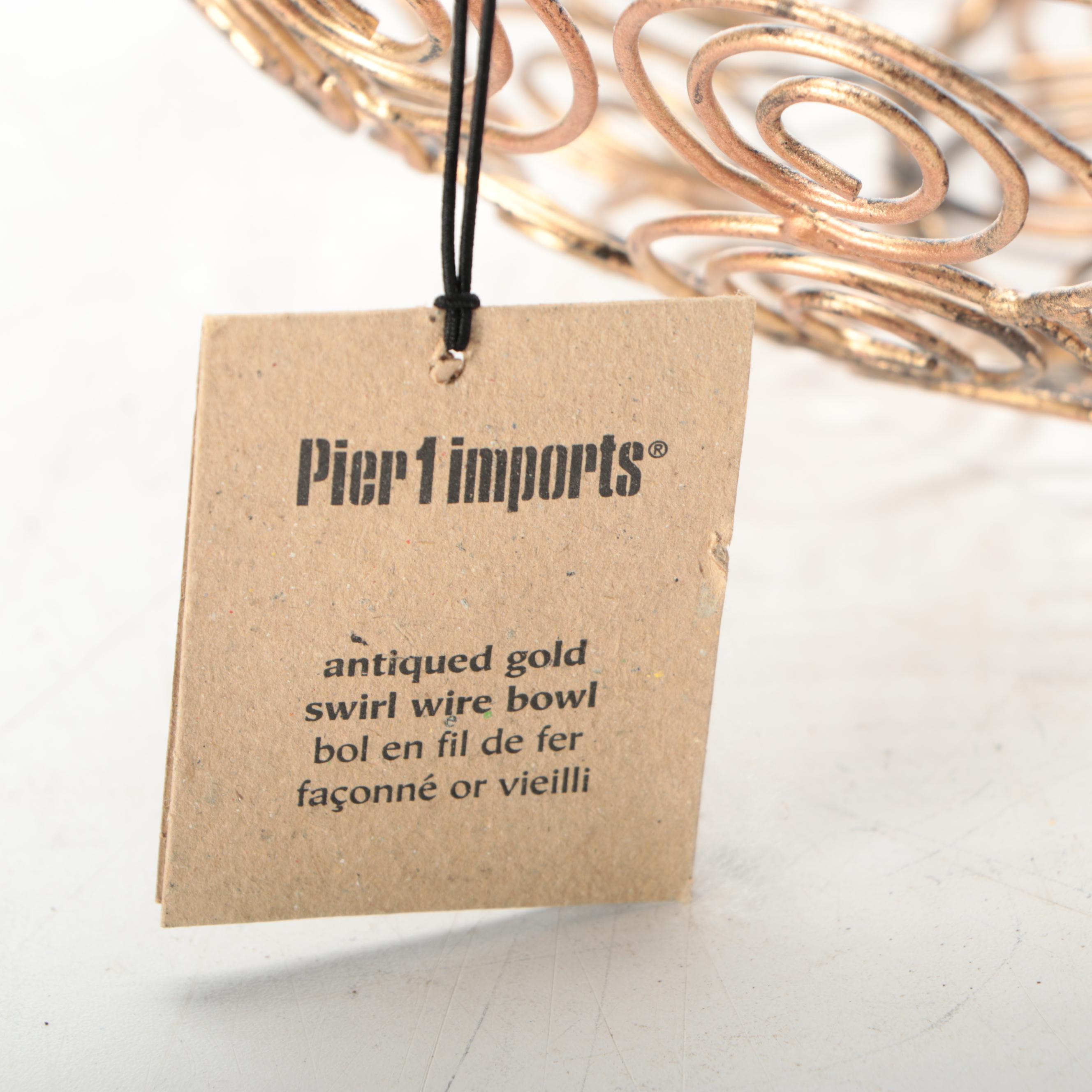 Antiqued Wire Bowl with Green Floral Vase and Other Décor