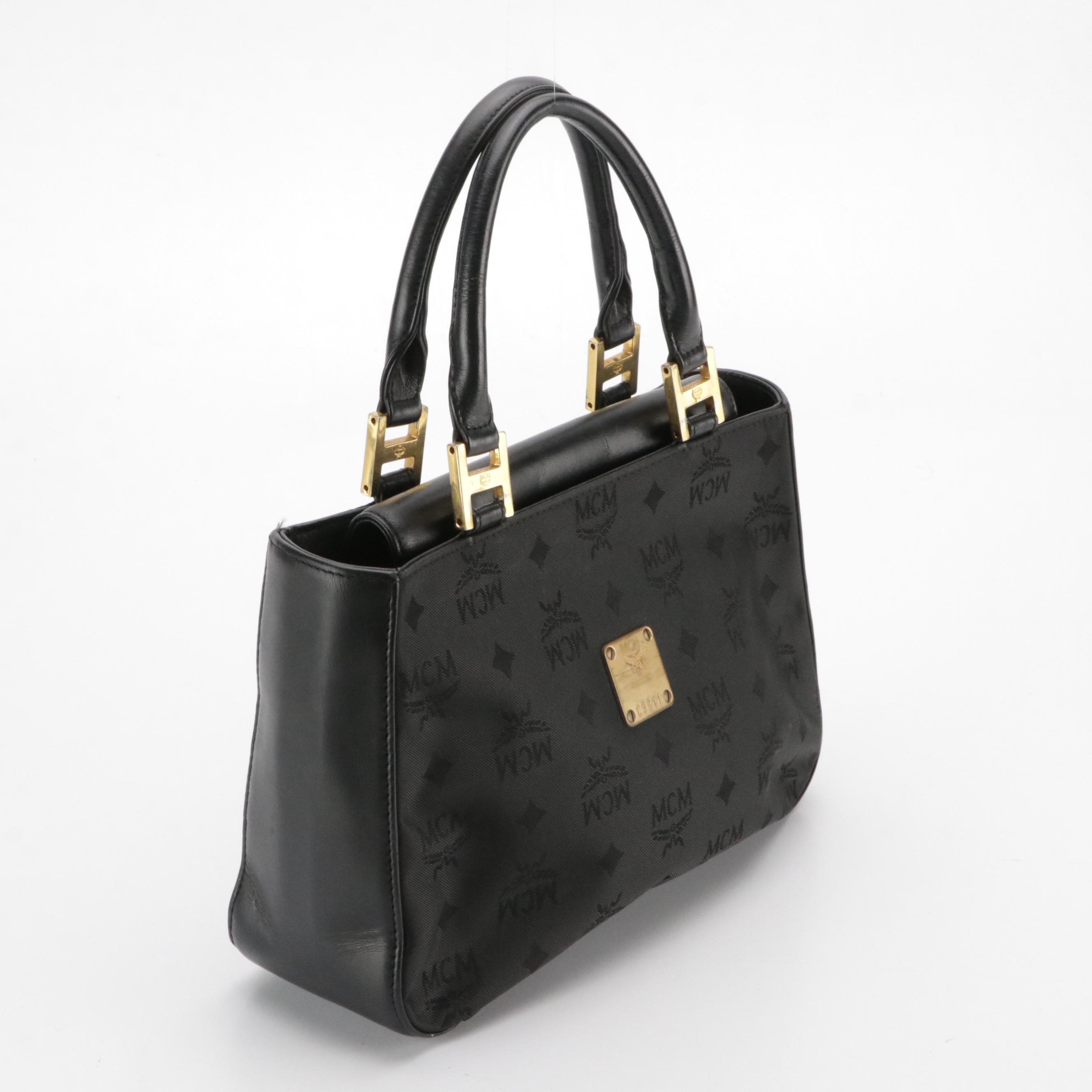 MCM Small Handbag in Black Visetos Jacquard Canvas and Calfskin Leather