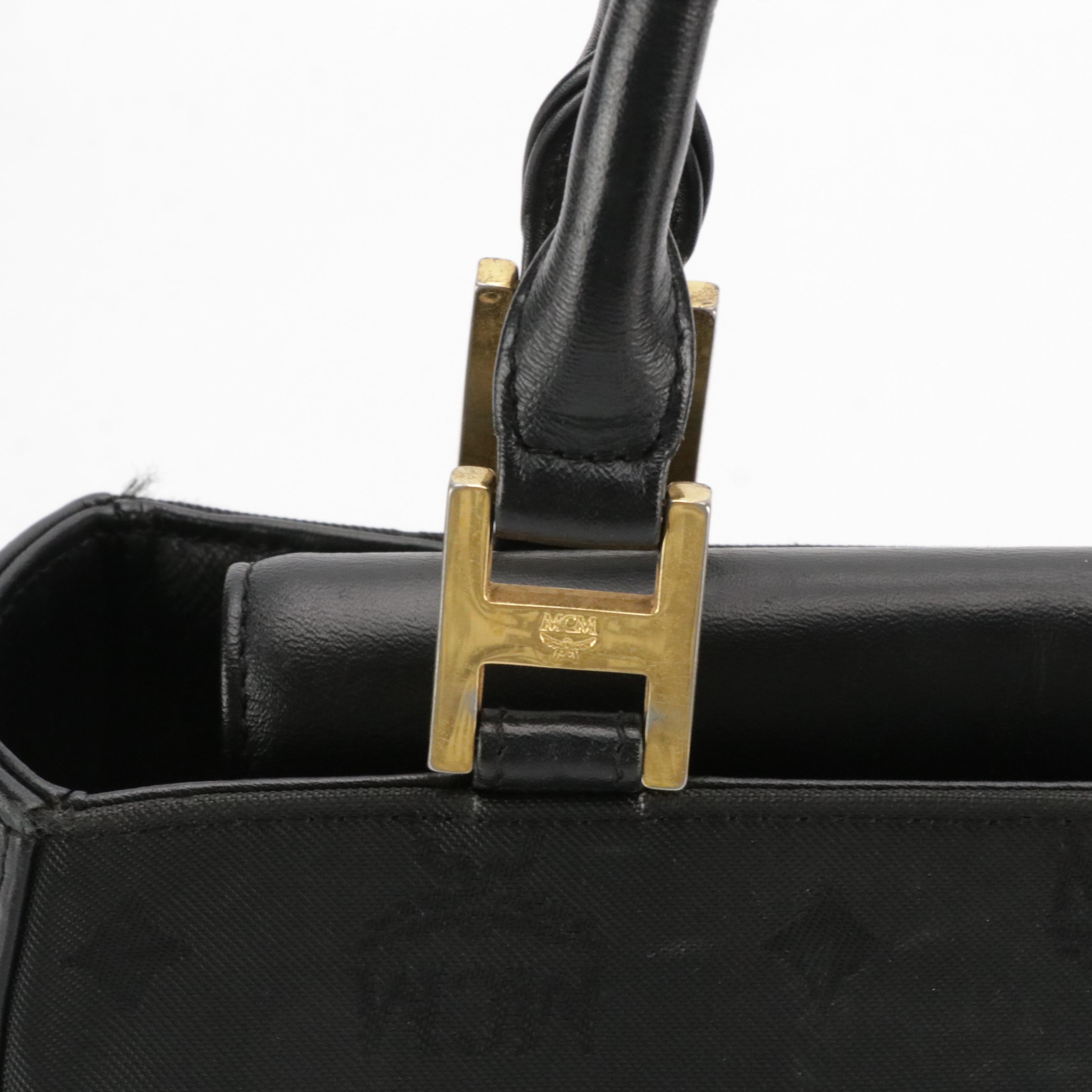 MCM Small Handbag in Black Visetos Jacquard Canvas and Calfskin Leather