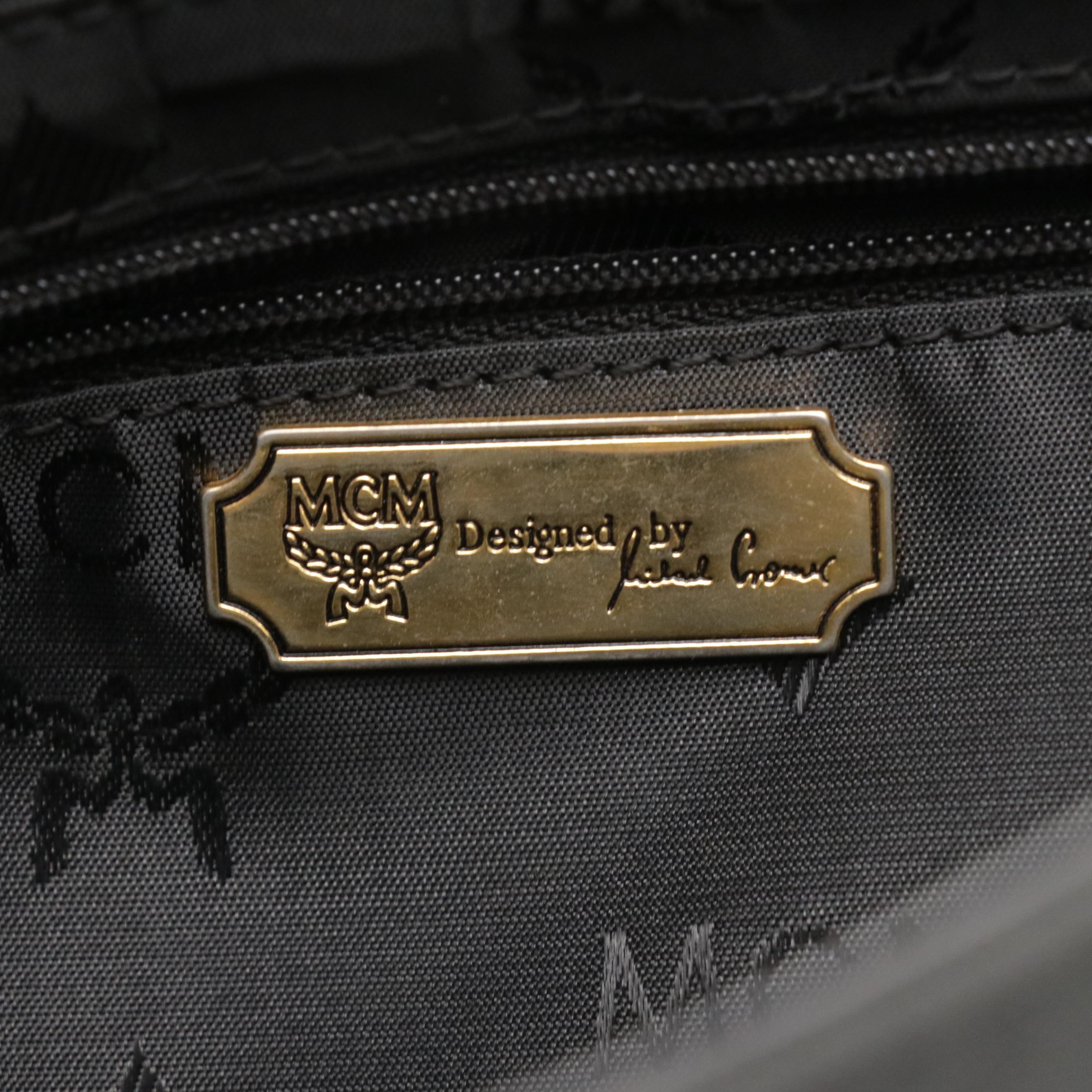 MCM Small Handbag in Black Visetos Jacquard Canvas and Calfskin Leather