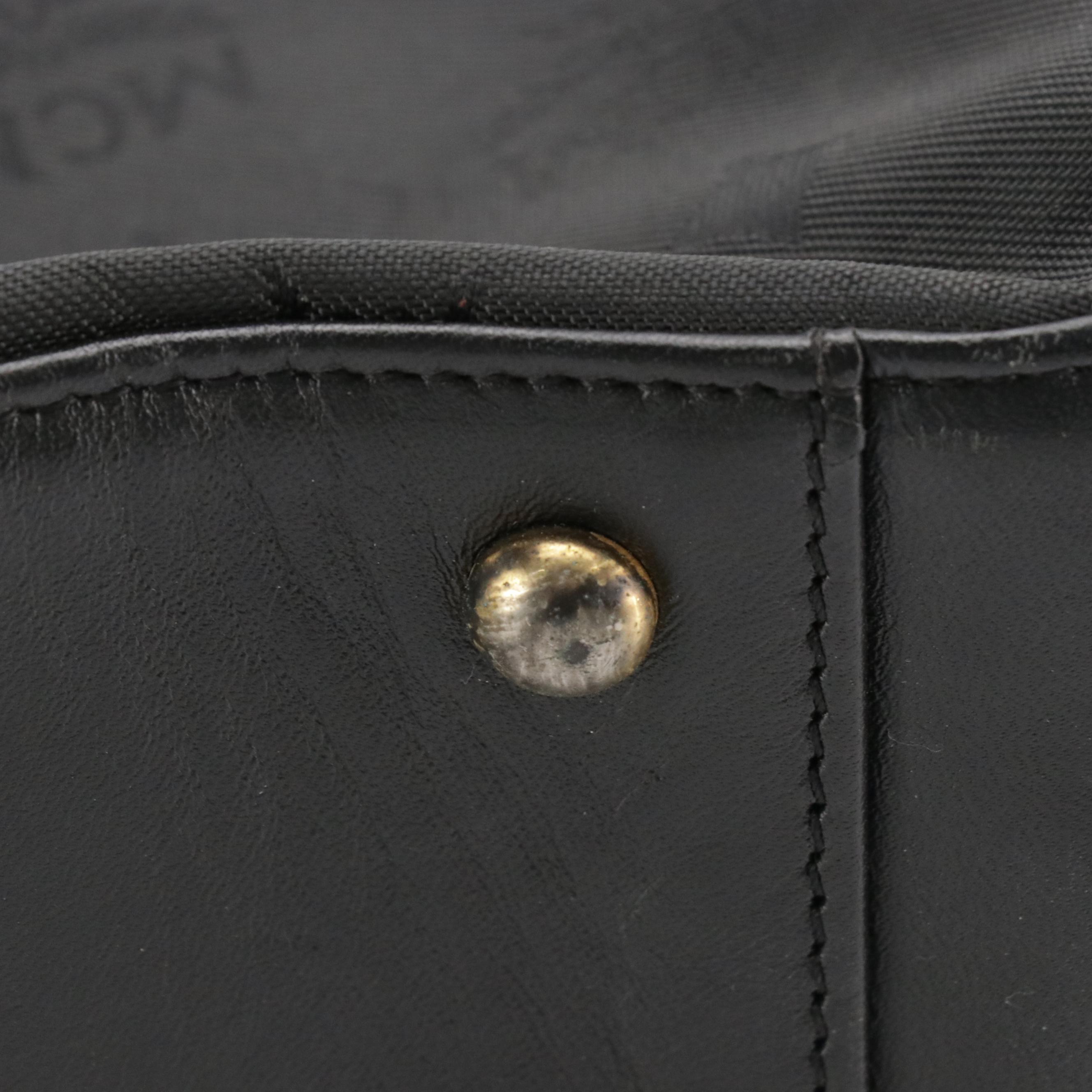 MCM Small Handbag in Black Visetos Jacquard Canvas and Calfskin Leather