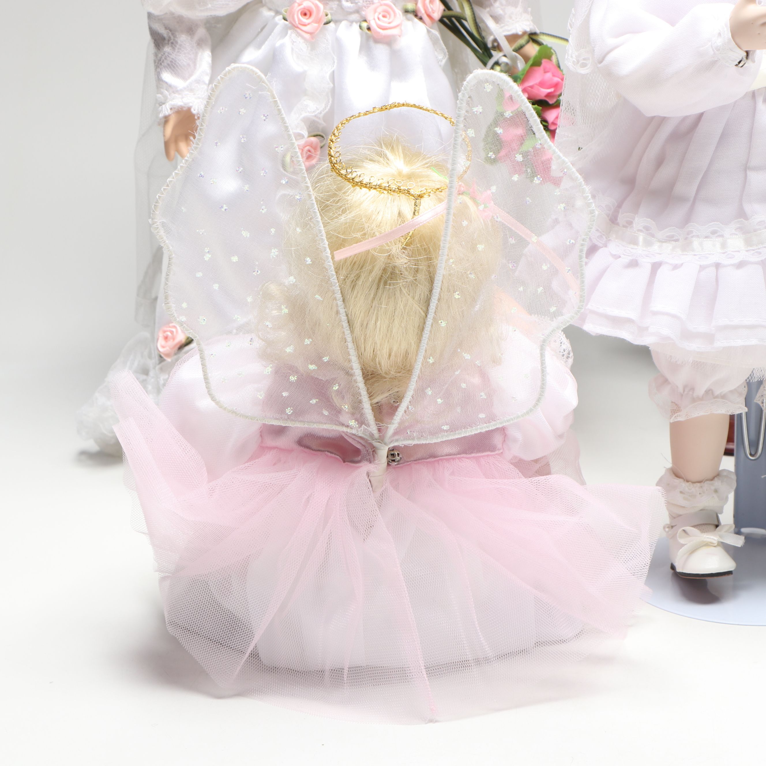 Seymour Mann Musical Porcelain Doll, Ashton-Drake Baby Doll, and More Dolls