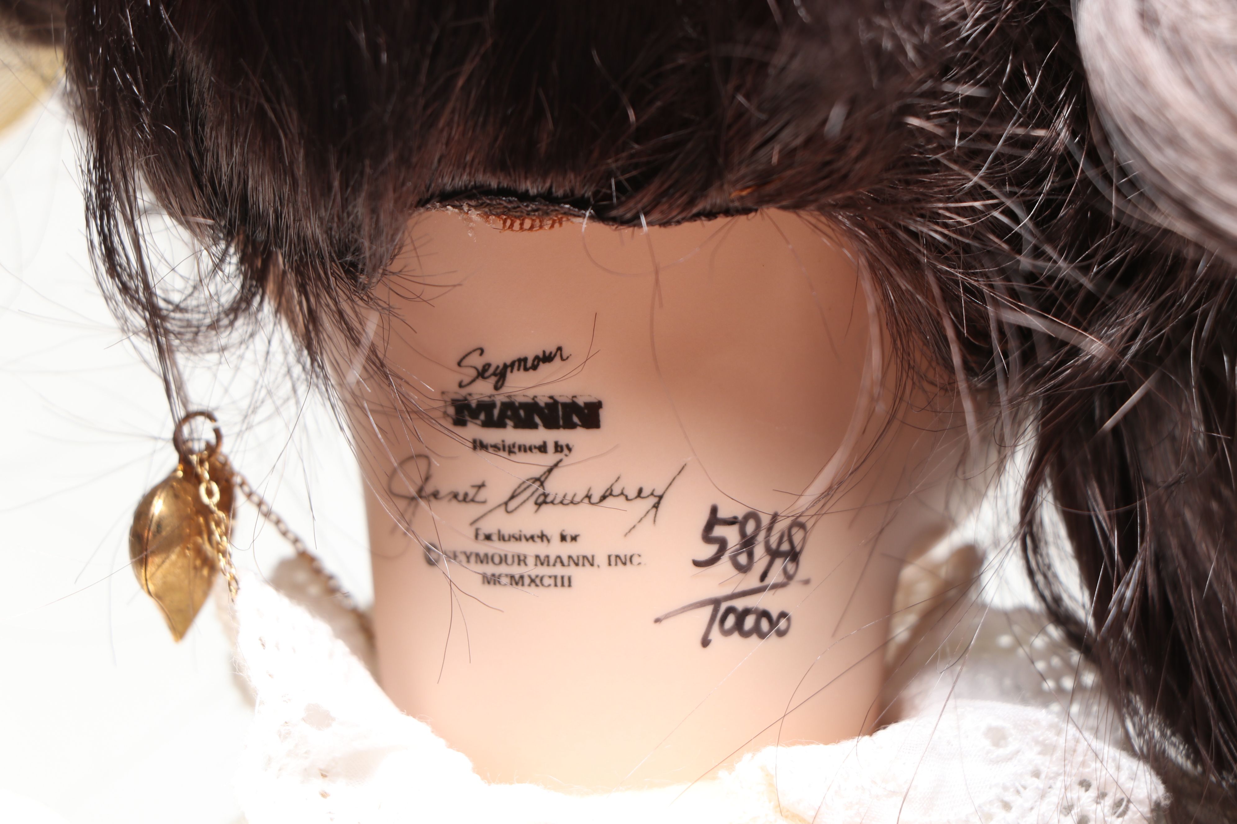 Seymour Mann Musical Porcelain Doll, Ashton-Drake Baby Doll, and More Dolls