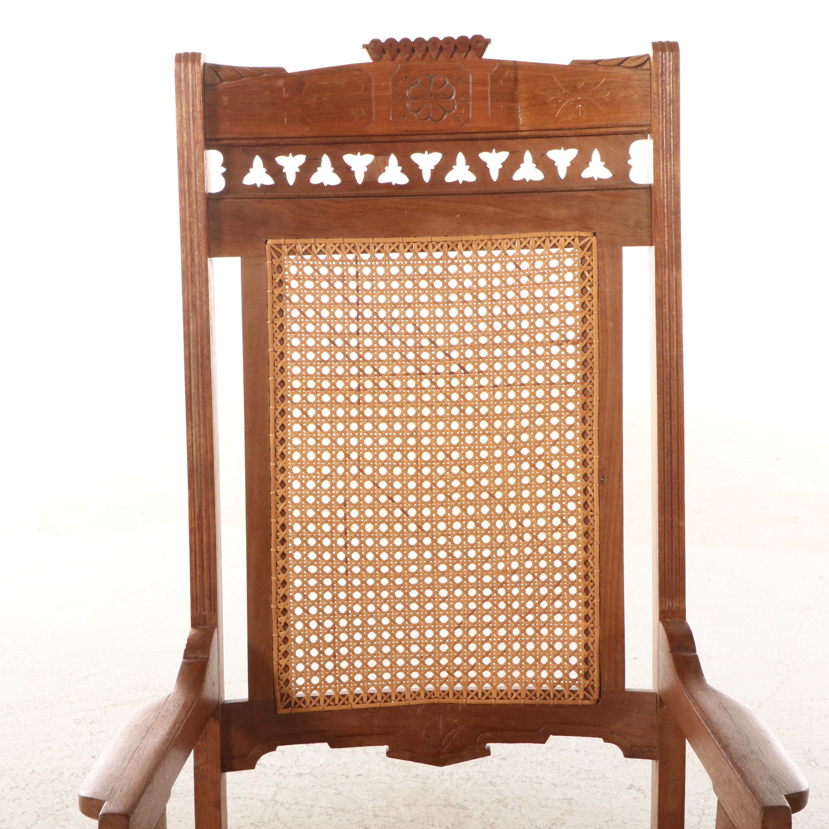 Eastlake Style Carved Walnut and Cane Rolling Desk Chair