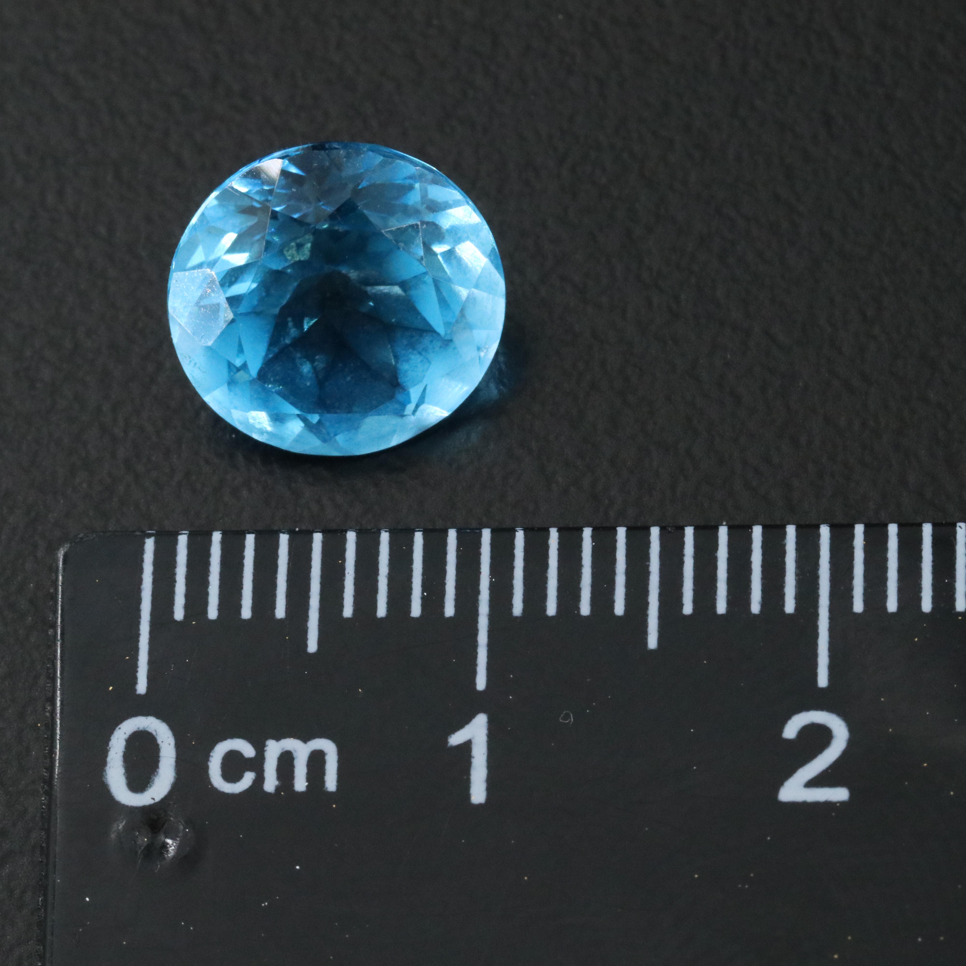 Loose 31.73 CTW Mixed Gemstones with Amethyst, Garnet, and Blue Topaz