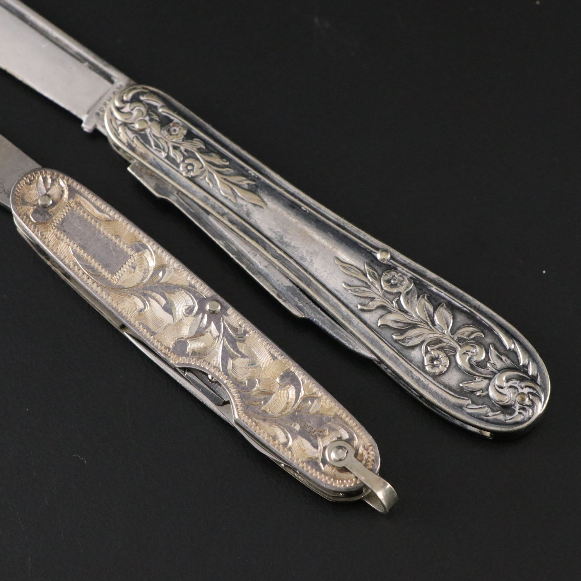 Four Victorian Silver and Silver Plate Folding Knives