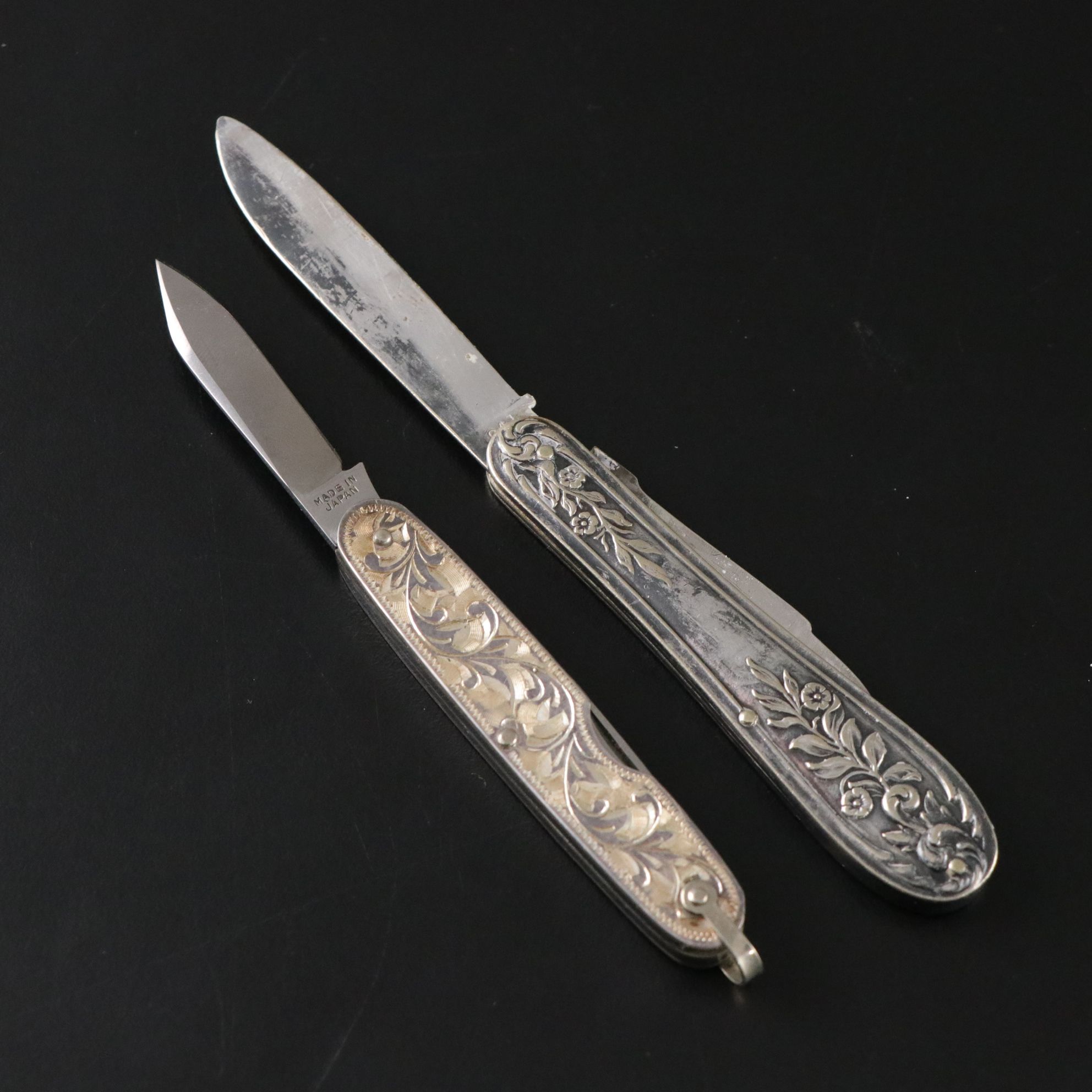 Four Victorian Silver and Silver Plate Folding Knives