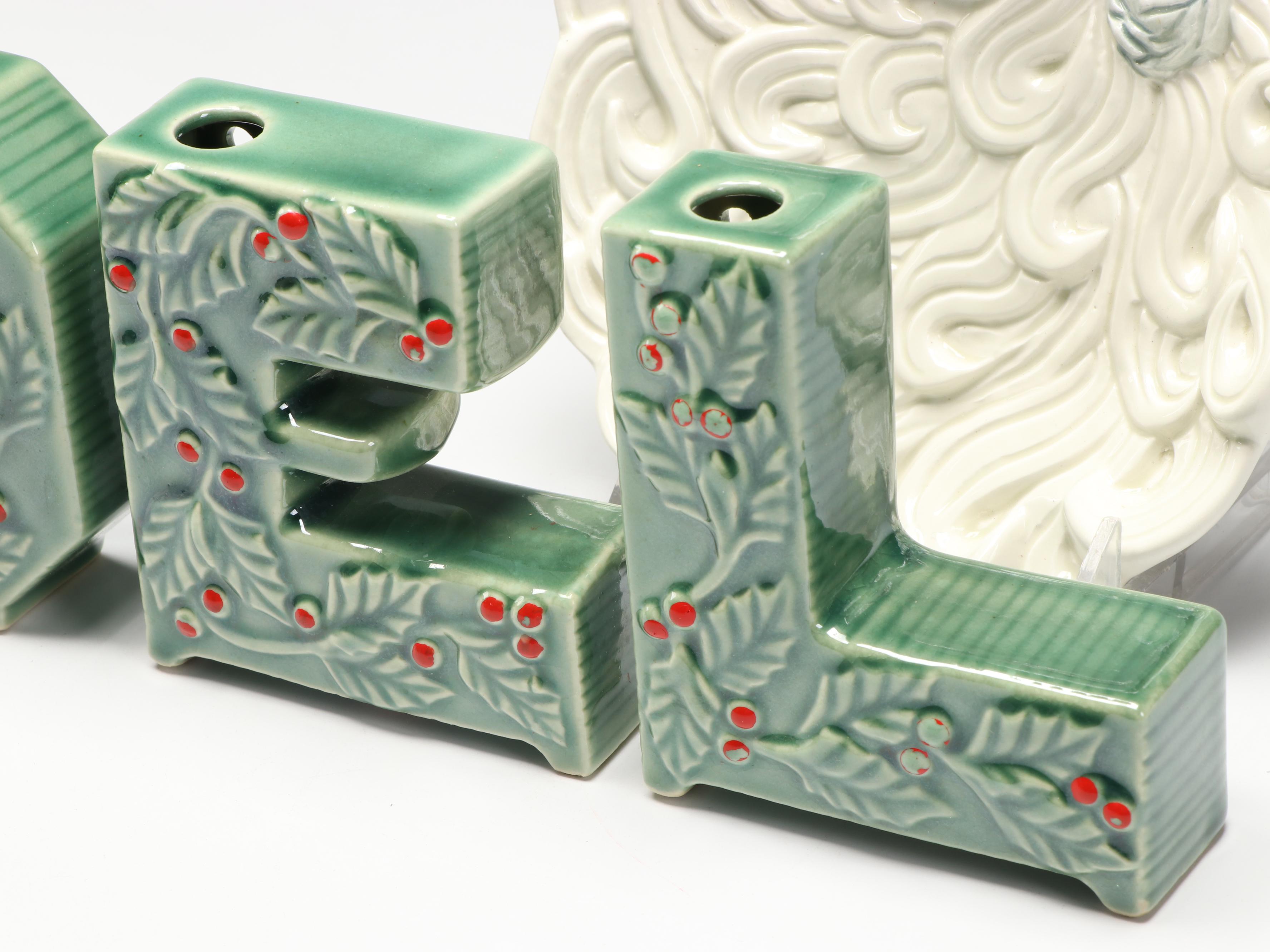 Louisville Stoneware Mr. and Mrs. Claus Figurines with Other Seasonal Décor