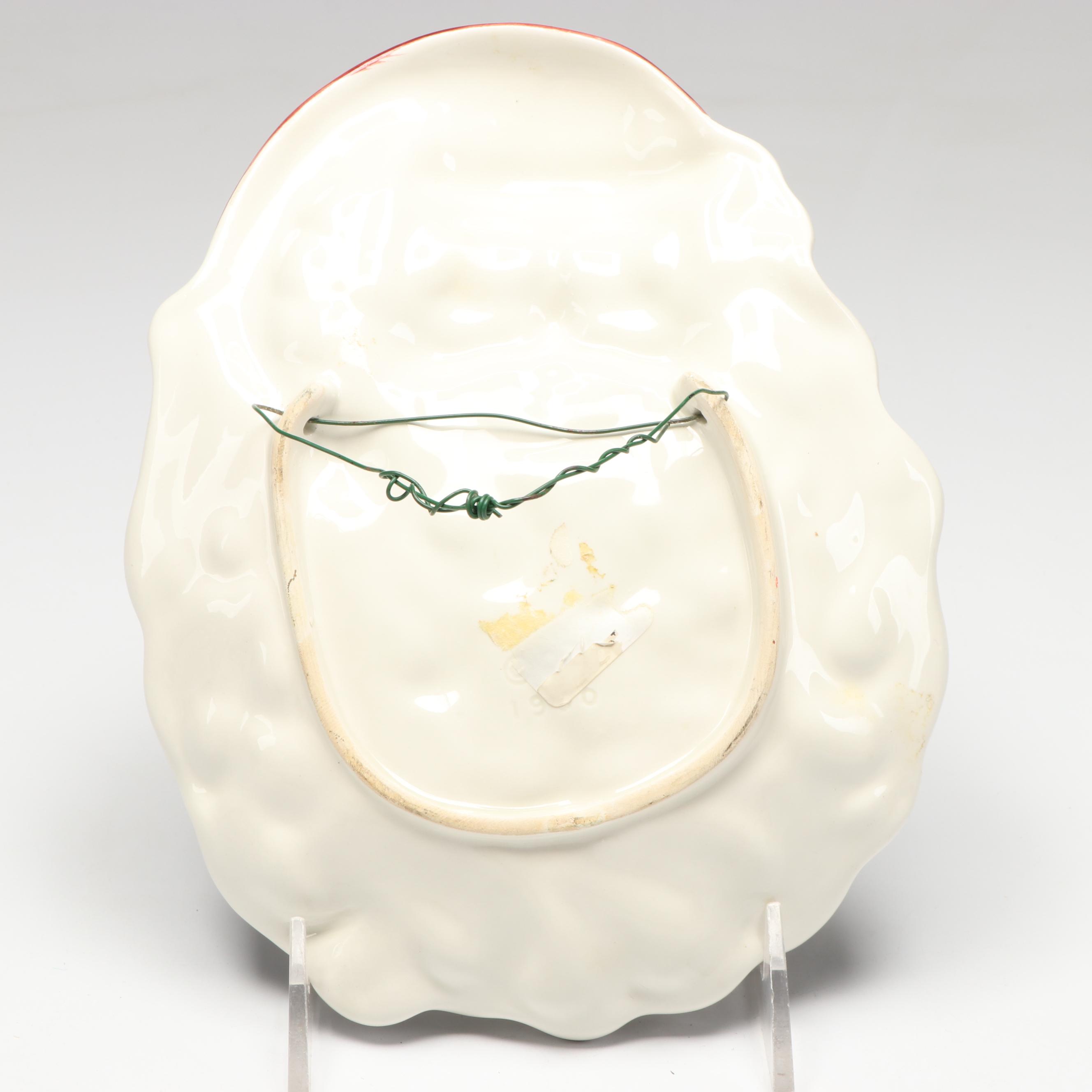 Louisville Stoneware Mr. and Mrs. Claus Figurines with Other Seasonal Décor