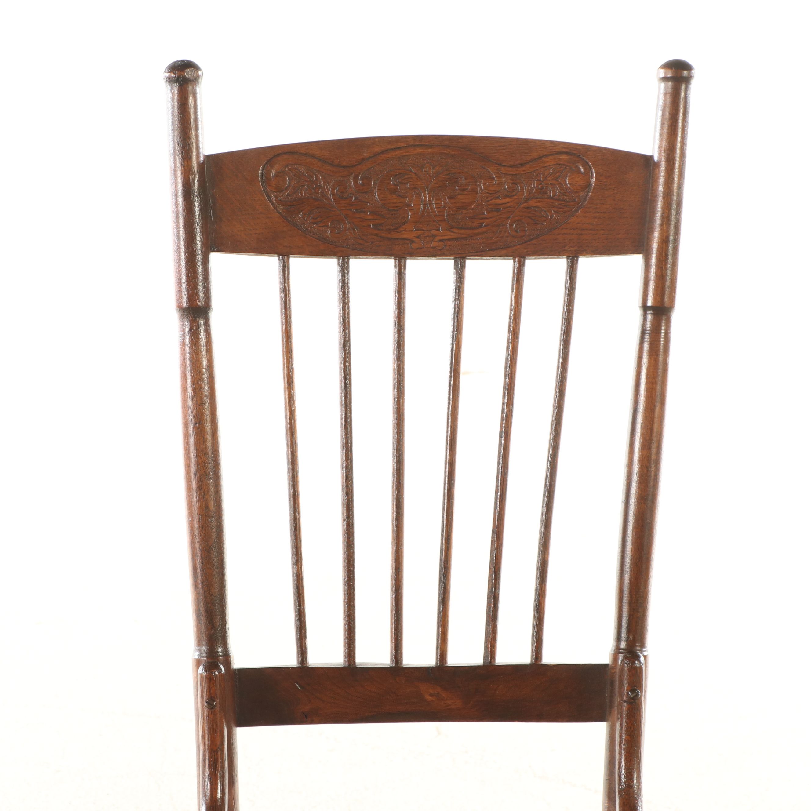 Antique Pressed Back Oak Rocking Chair