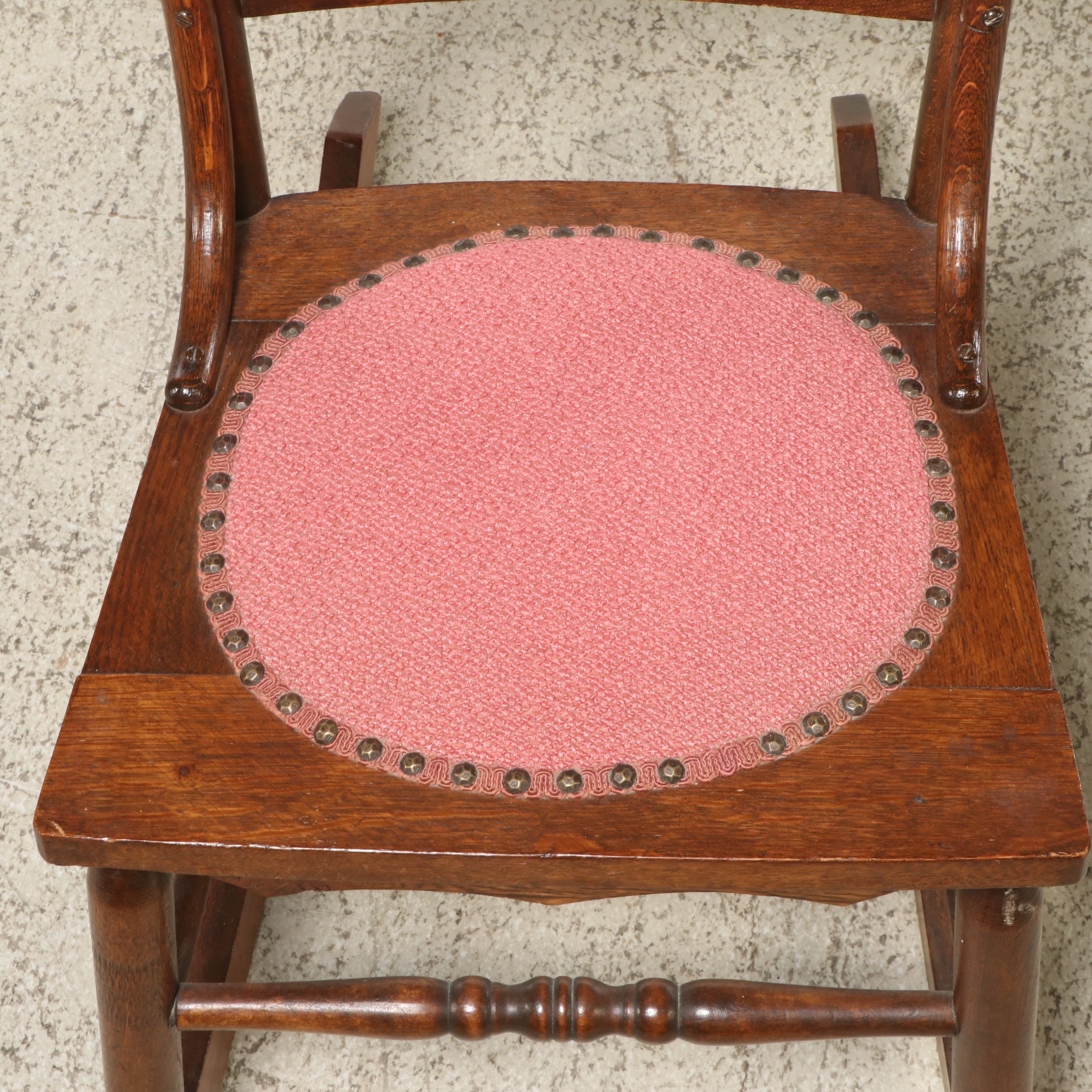 Antique Pressed Back Oak Rocking Chair