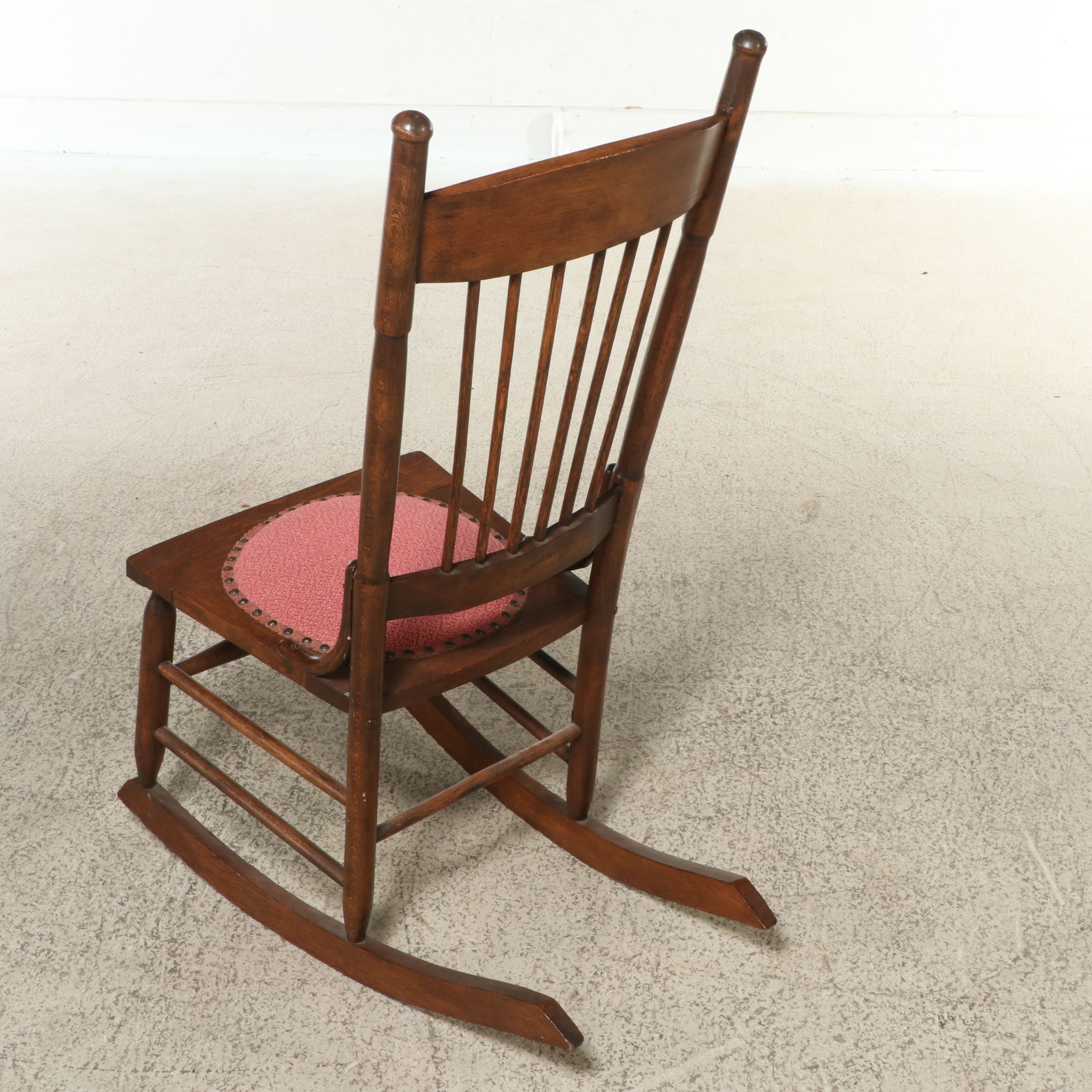 Antique Pressed Back Oak Rocking Chair