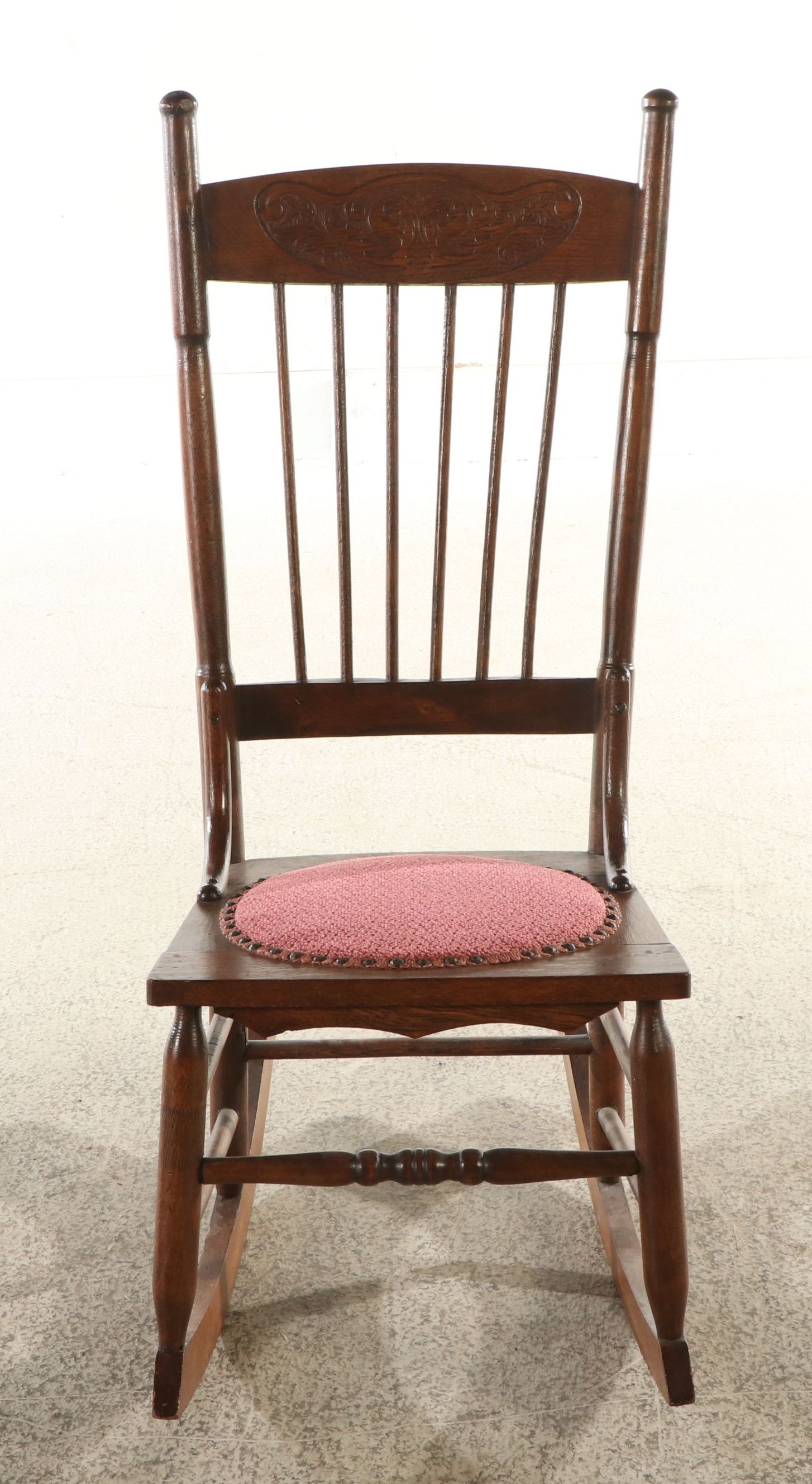 Antique Pressed Back Oak Rocking Chair