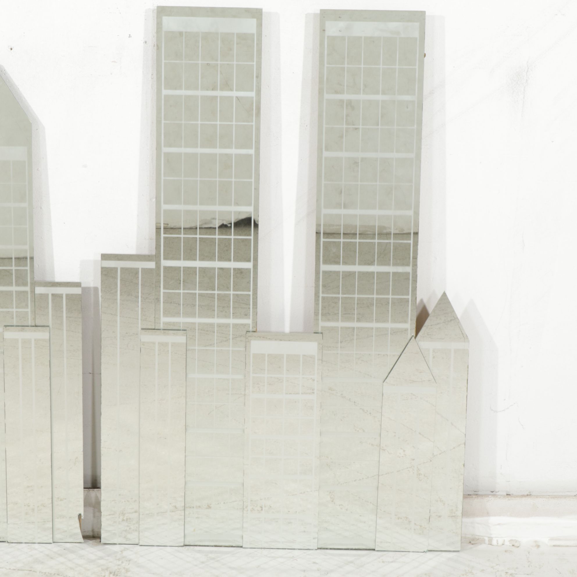 Two Urban Skyline Style Mirrored Wall Hanging Decorations