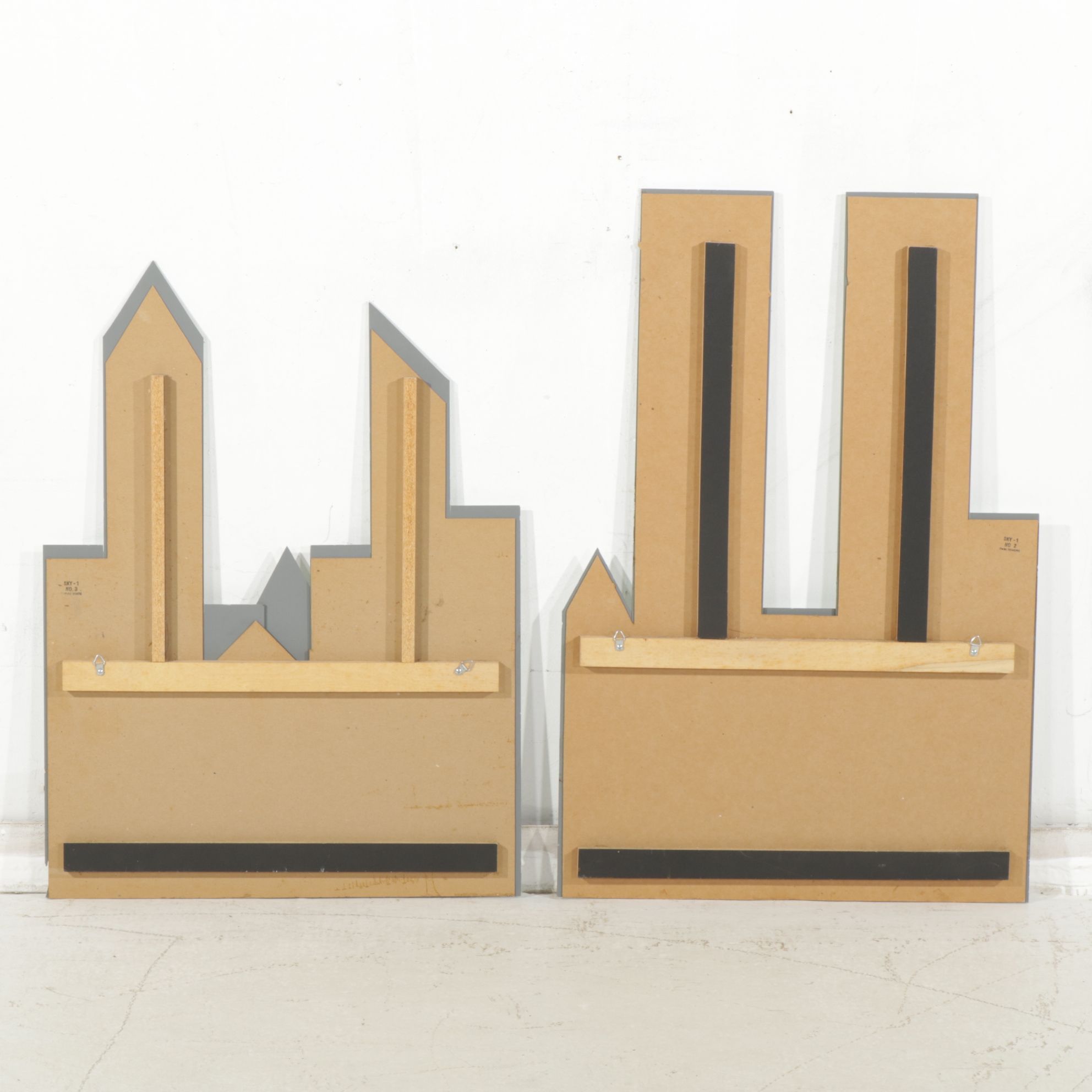 Two Urban Skyline Style Mirrored Wall Hanging Decorations