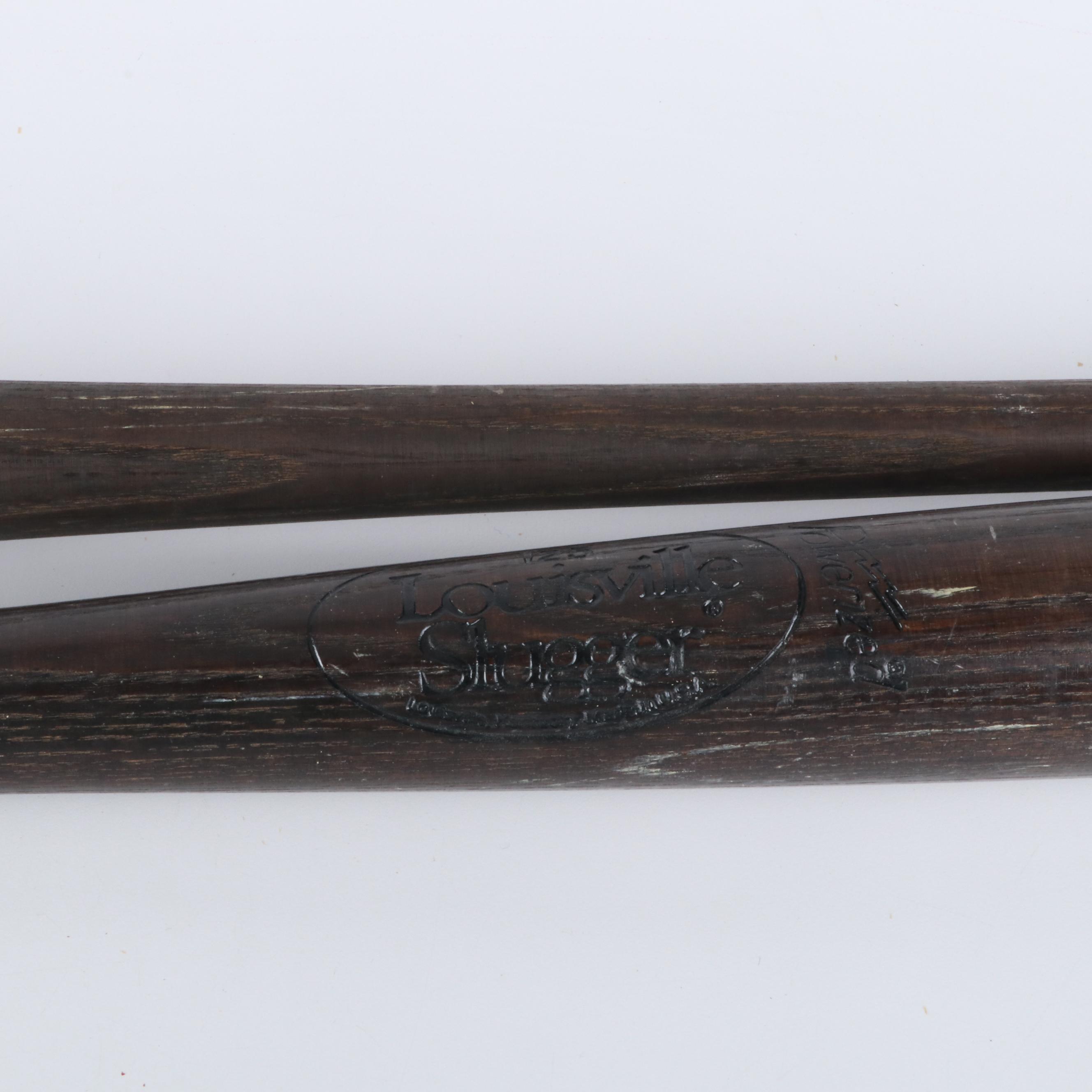 Four Vintage Baseball Bats, Louisville Slugger and Adirondack