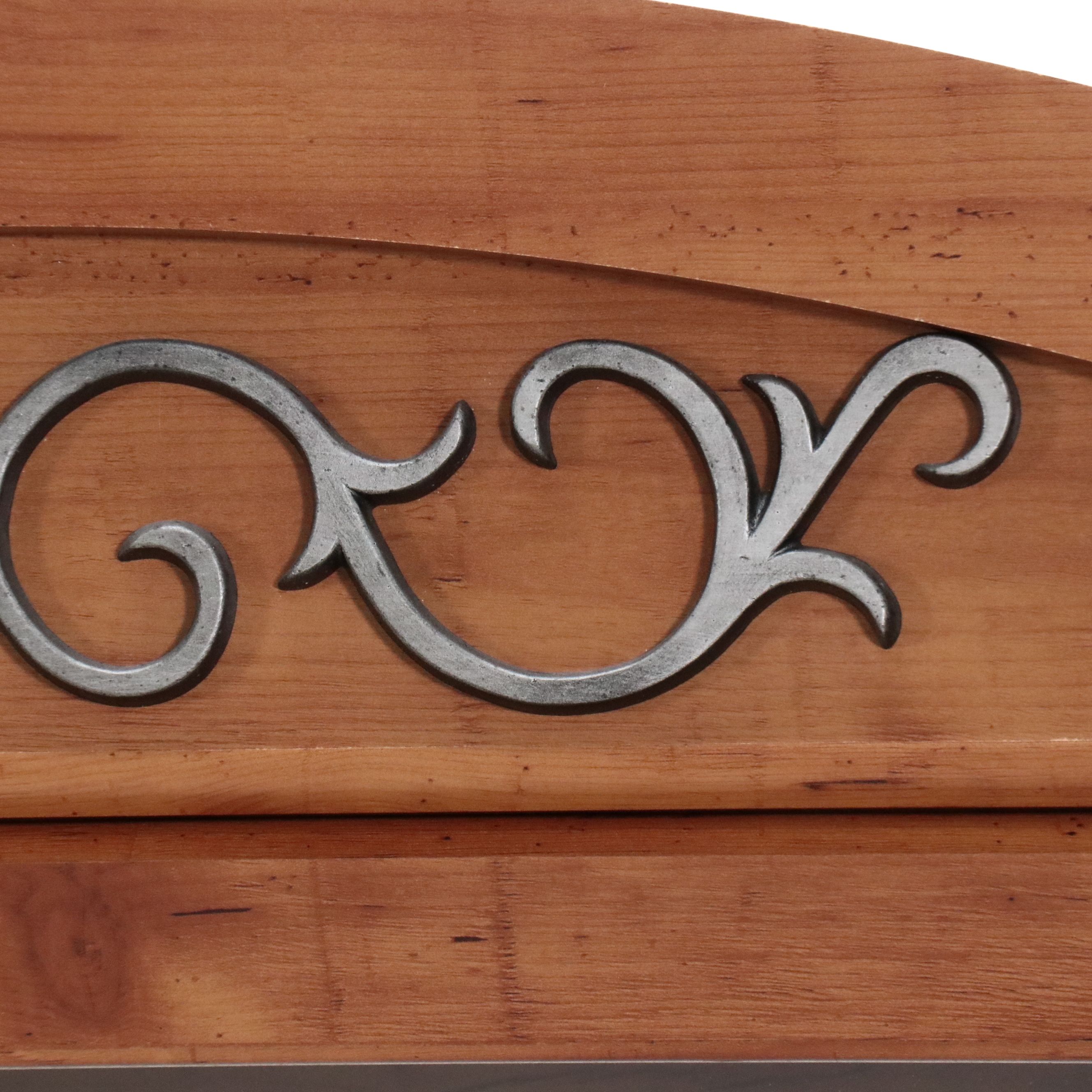 Illuminated Pine Curio Cabinet with Scrolled Metal Accent