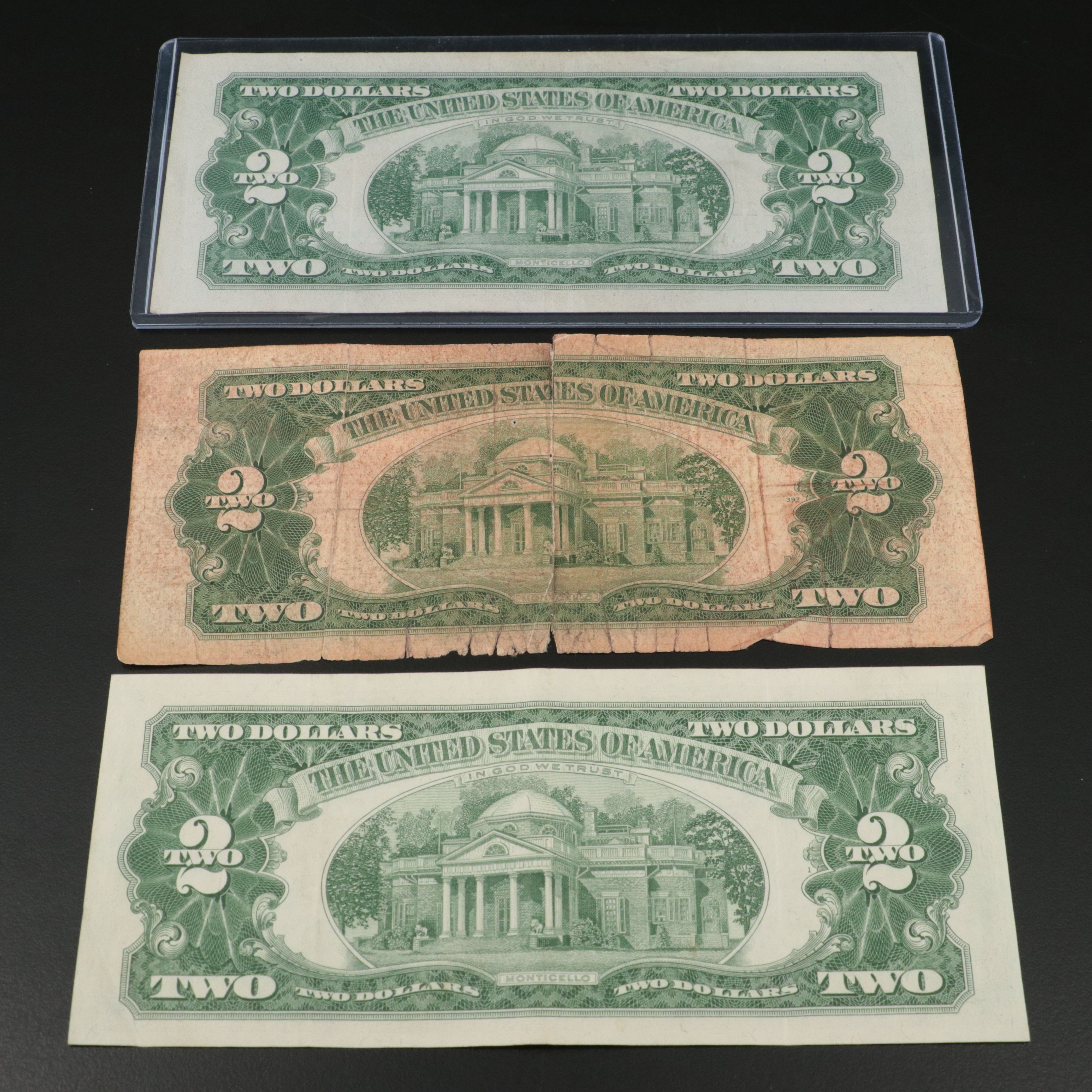 Sixteen U.S. Currency Notes with Writing on Them
