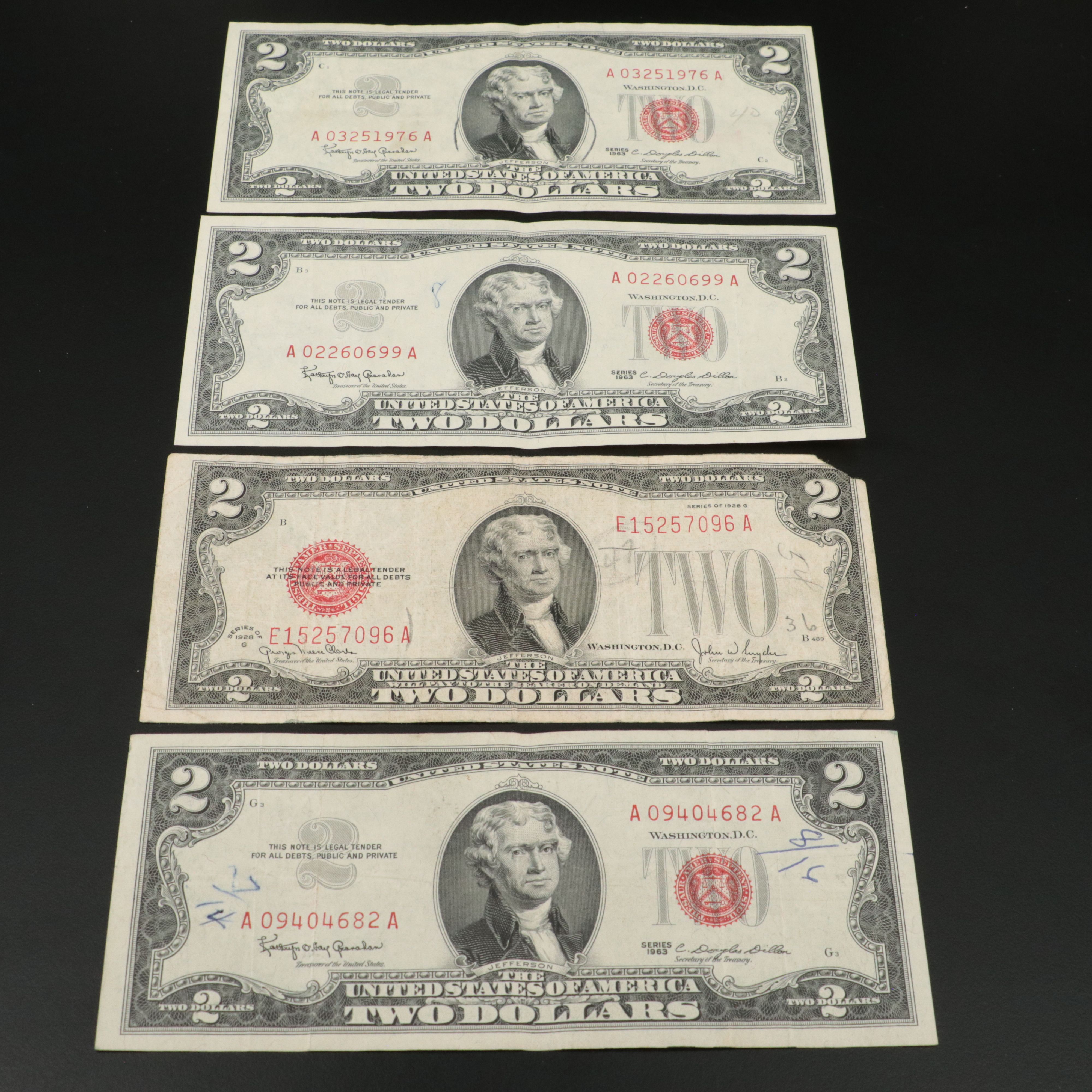 Sixteen U.S. Currency Notes with Writing on Them