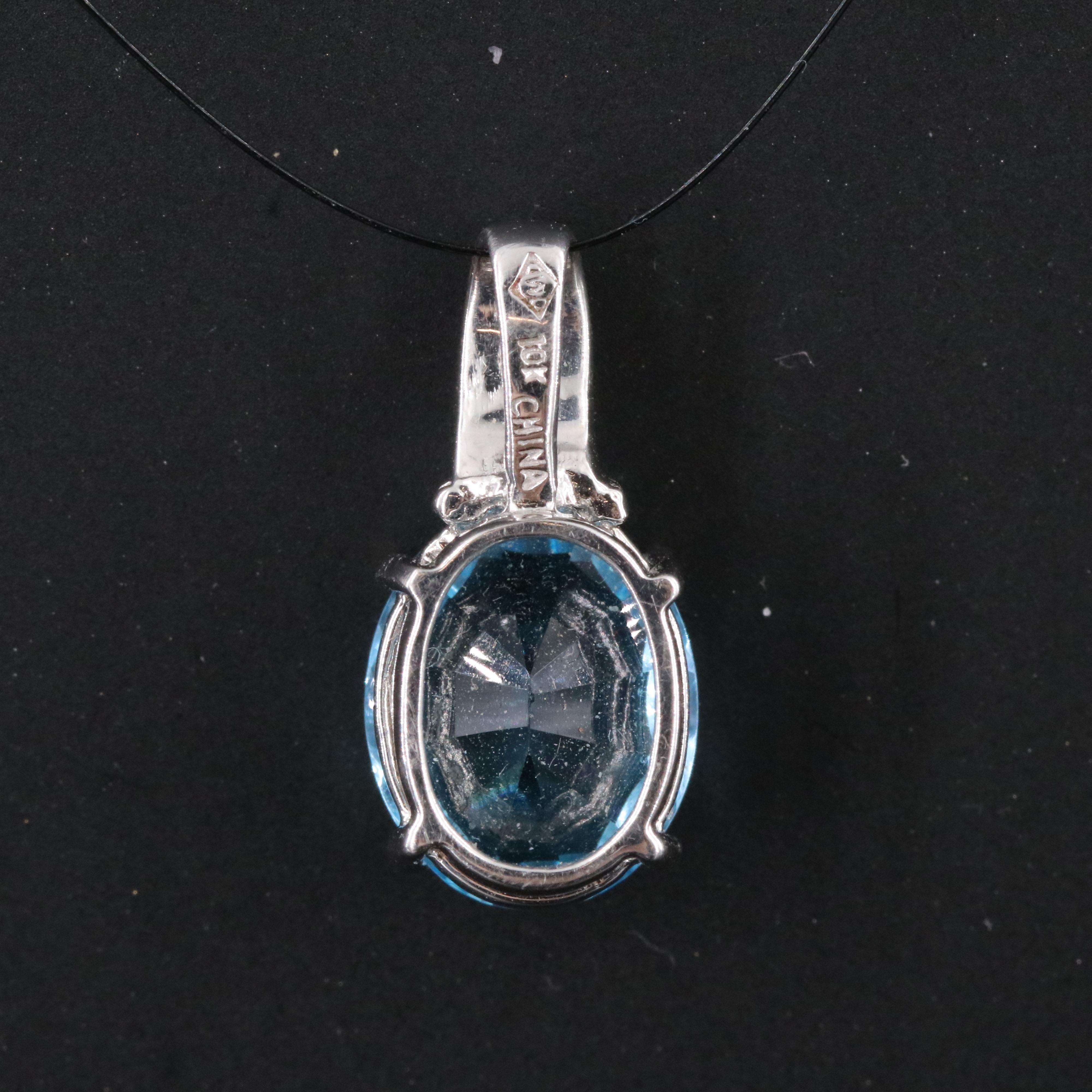 10K Swiss Blue Topaz and Diamond Pendant