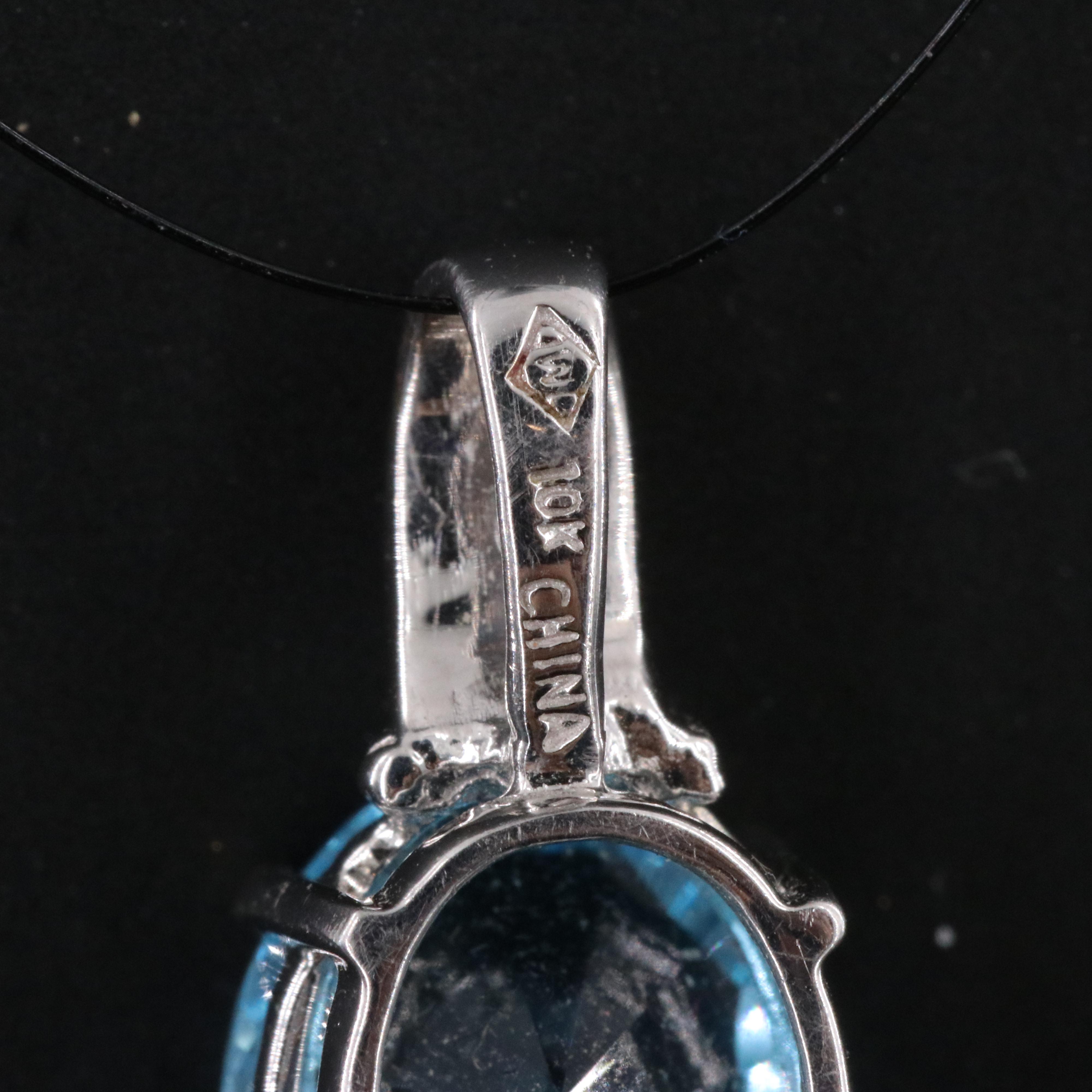 10K Swiss Blue Topaz and Diamond Pendant