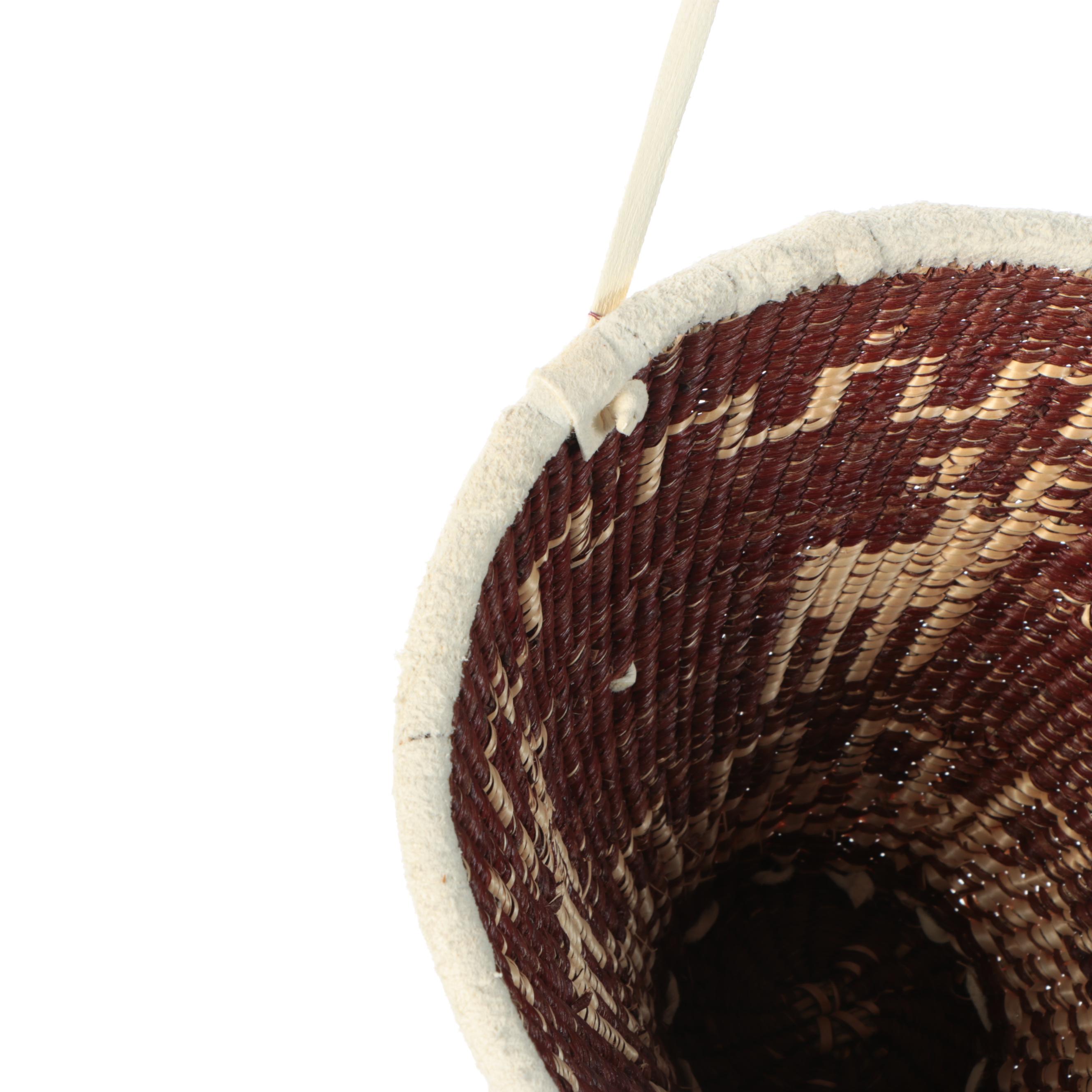 Mary Jane Dudley Indé (Apache) Willow and Buckskin Burden Basket with Jingles