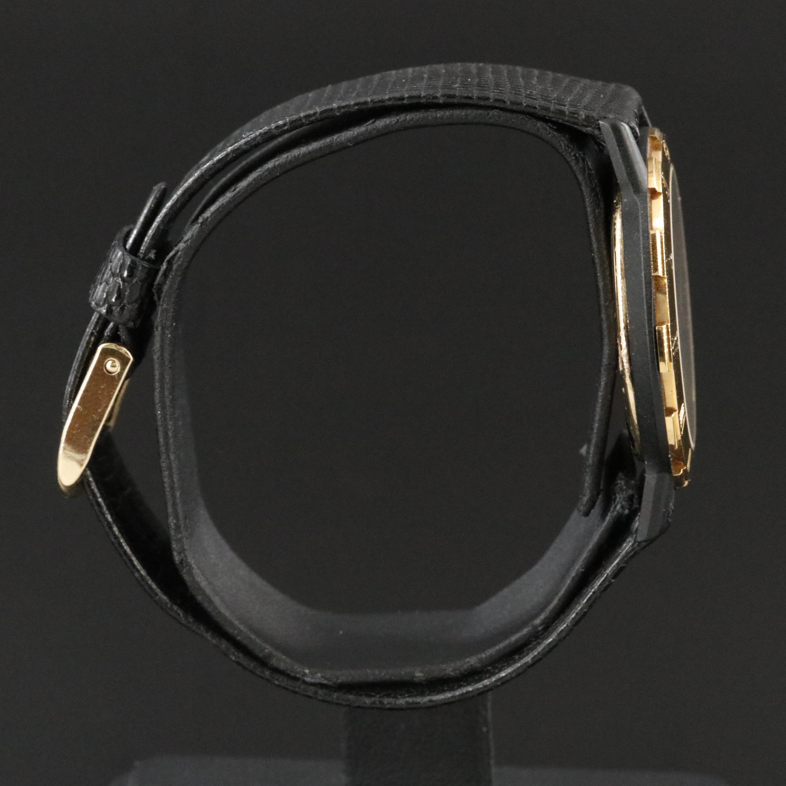 Gucci Black Dial Gold Tone Bezel Watch