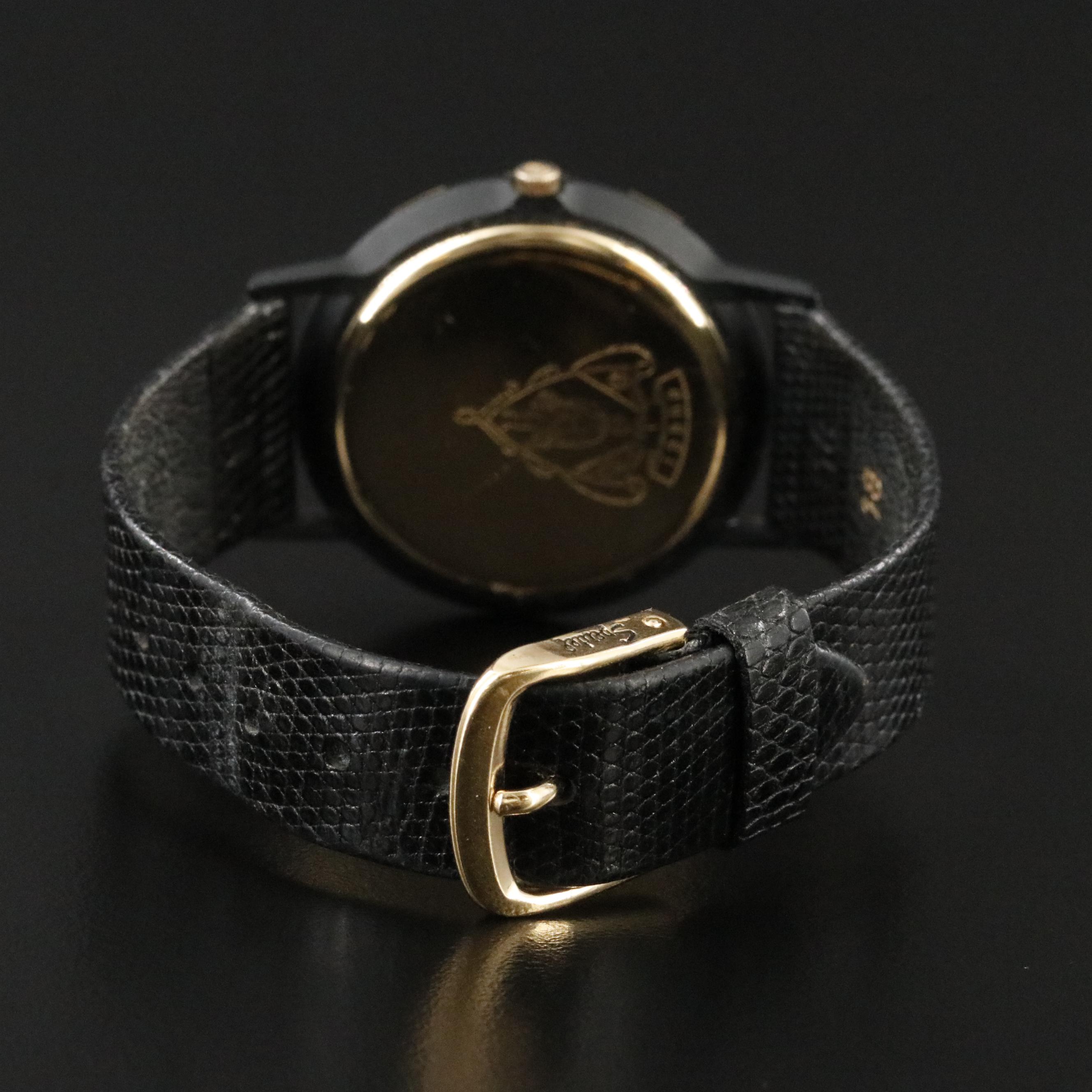 Gucci Black Dial Gold Tone Bezel Watch