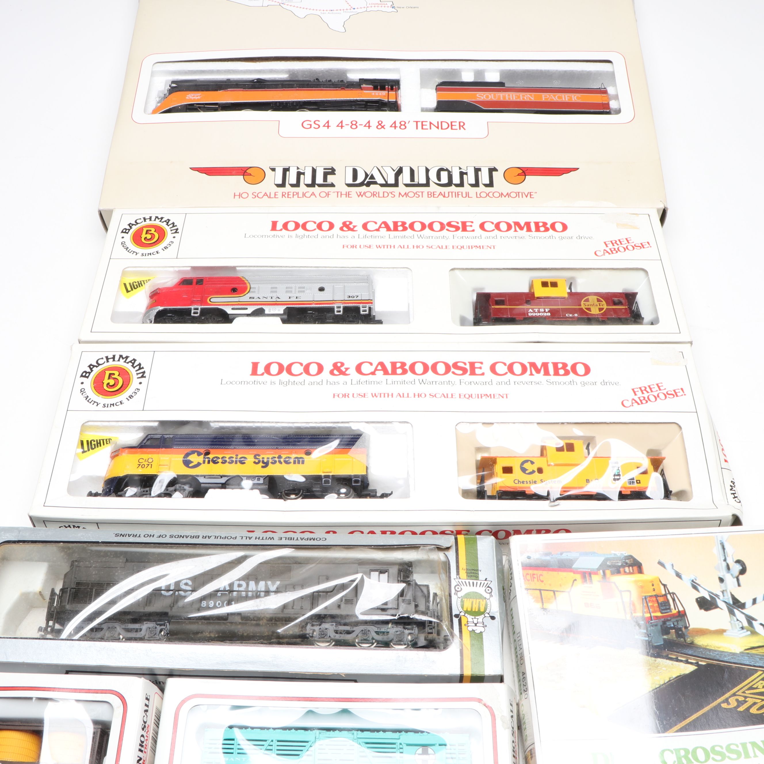 Bachmann "The Daylight" Locomotive and Caboose with More HO Scale Freight Cars