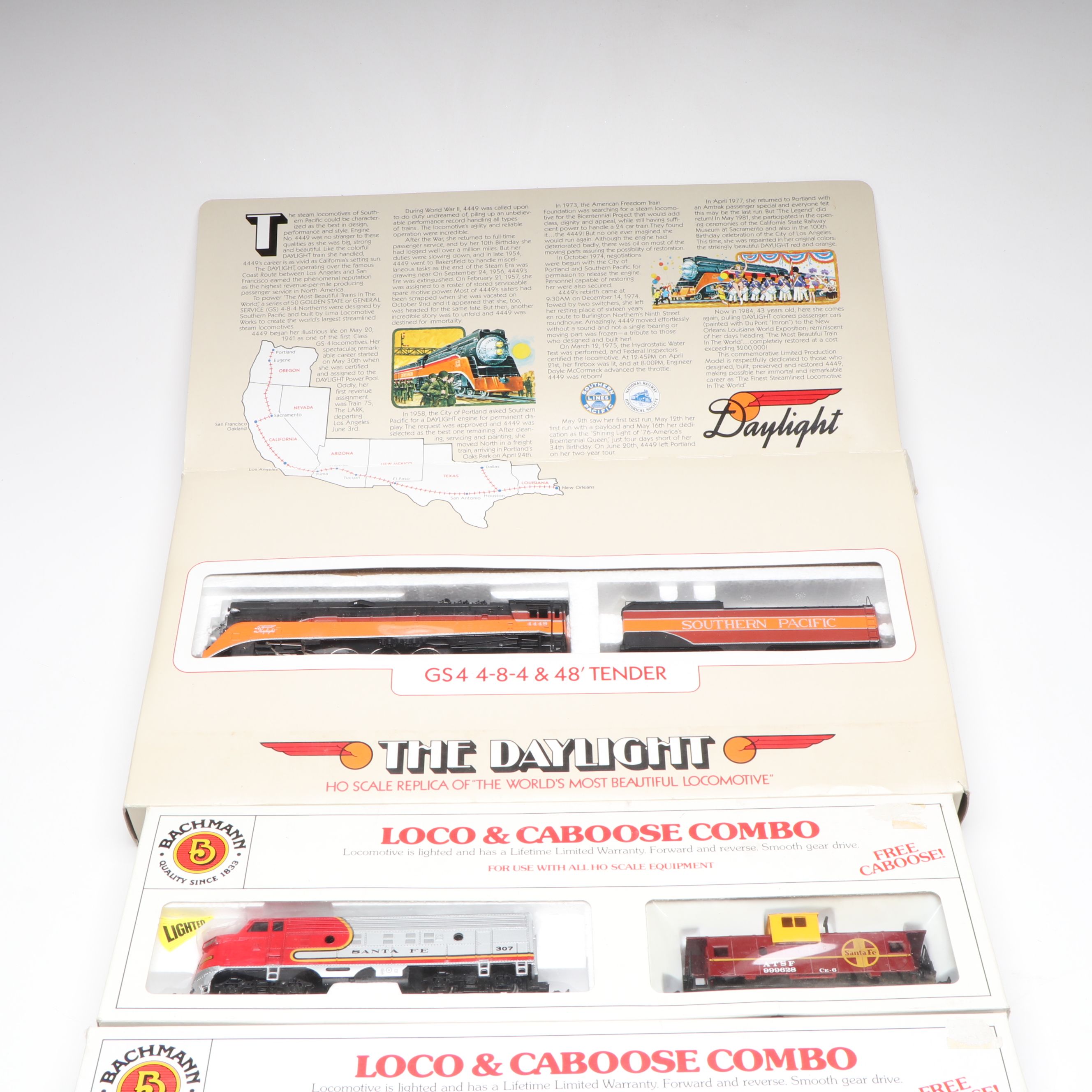 Bachmann "The Daylight" Locomotive and Caboose with More HO Scale Freight Cars