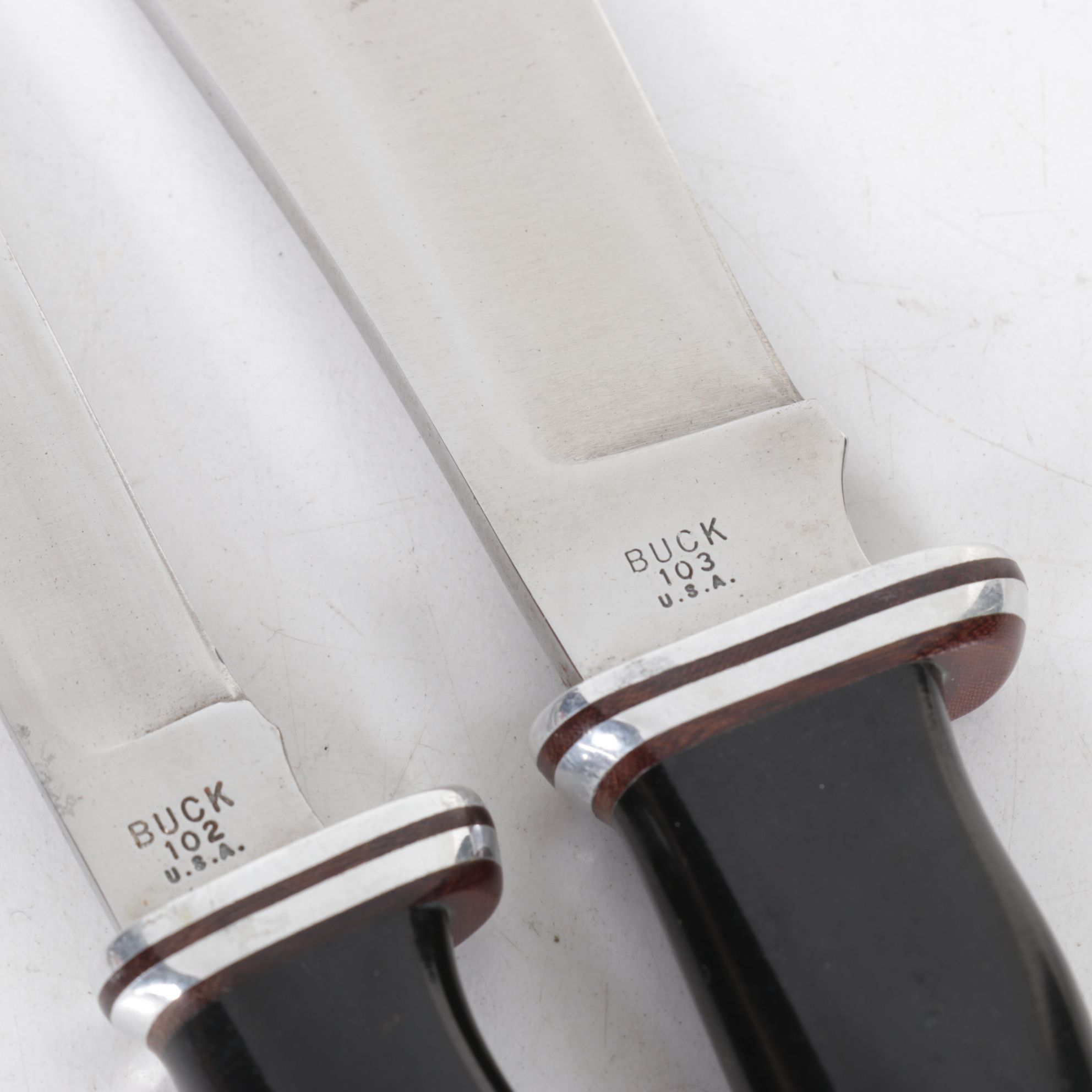 Three Buck Fixed Blade Knives, Late 20th Century