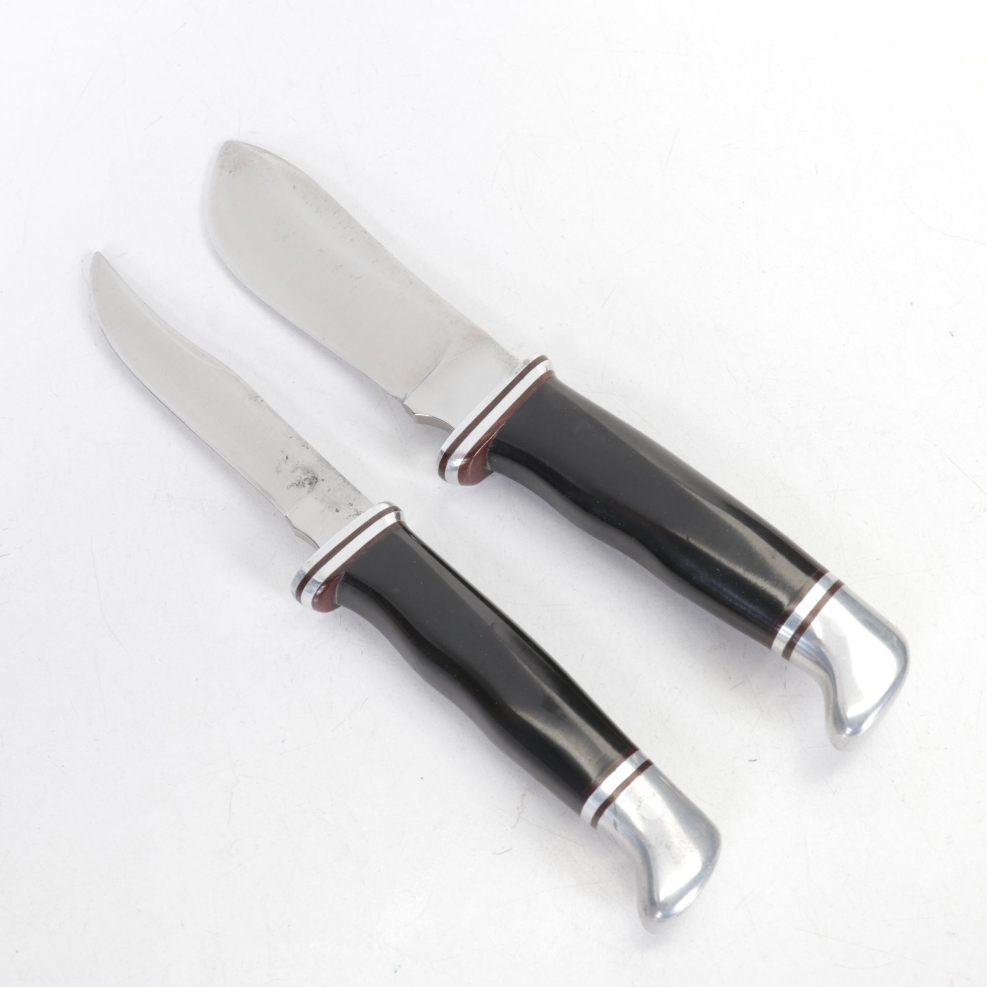 Three Buck Fixed Blade Knives, Late 20th Century