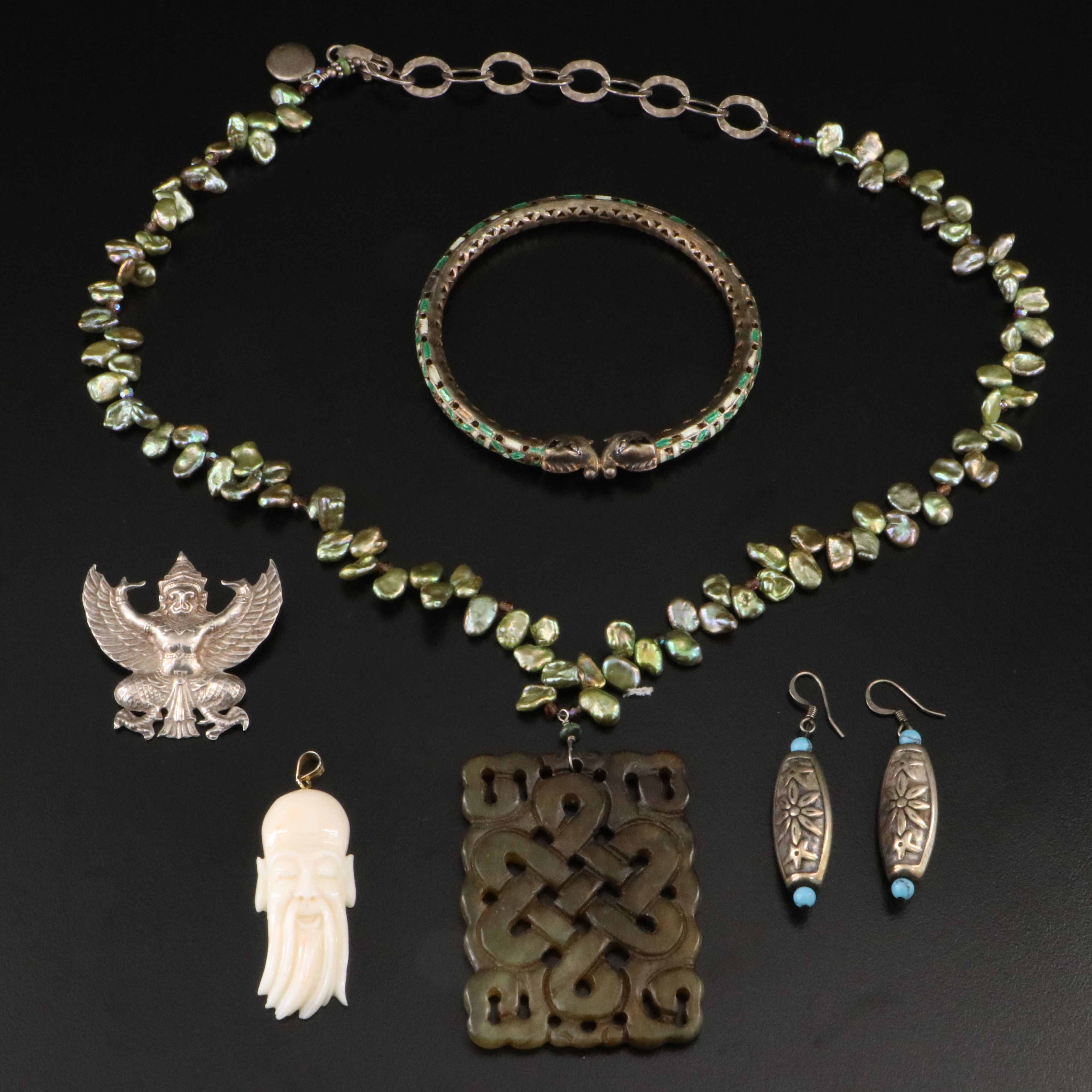 Siam Sterling Garuda, Coral and Pearls Featured in Jewelry Collection
