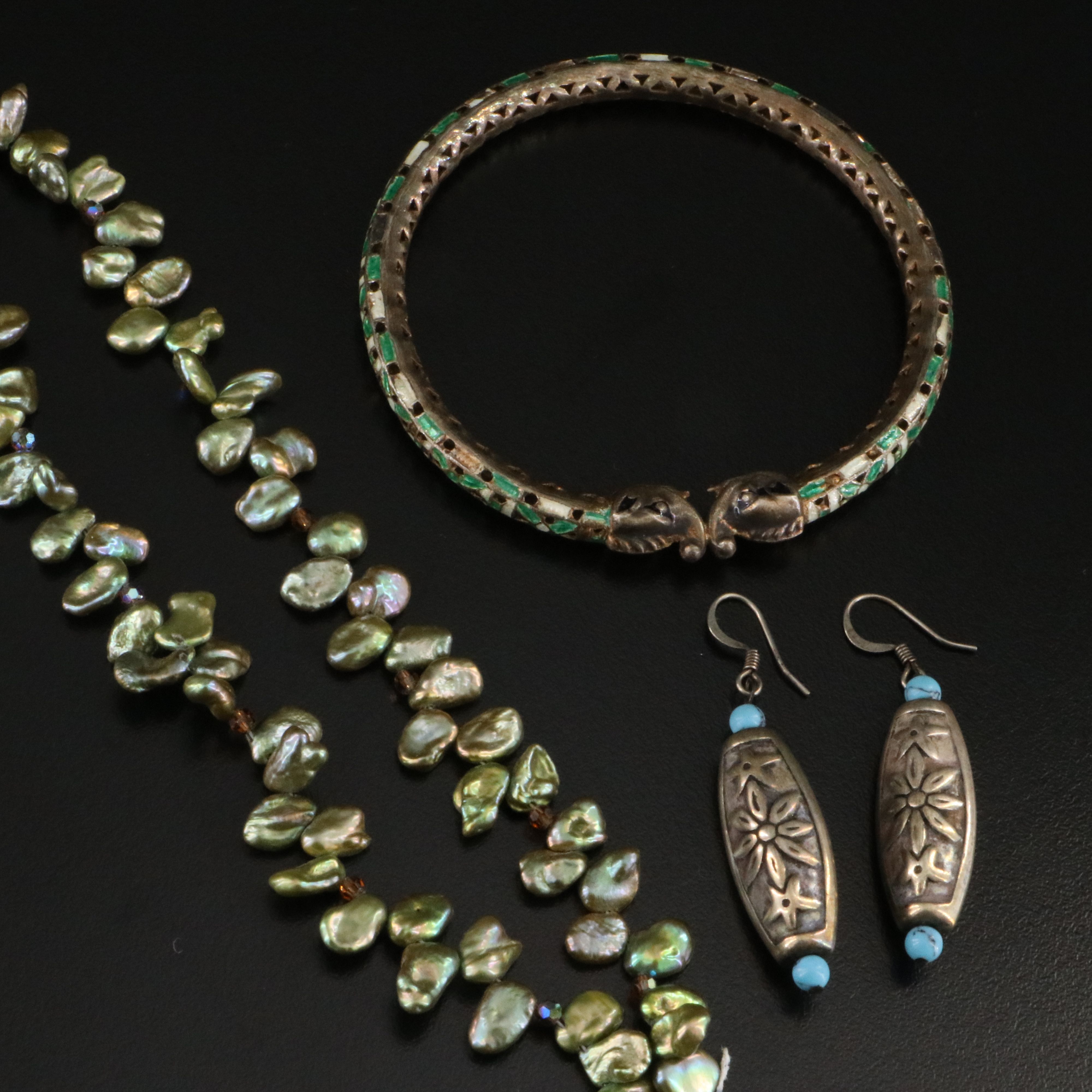 Siam Sterling Garuda, Coral and Pearls Featured in Jewelry Collection