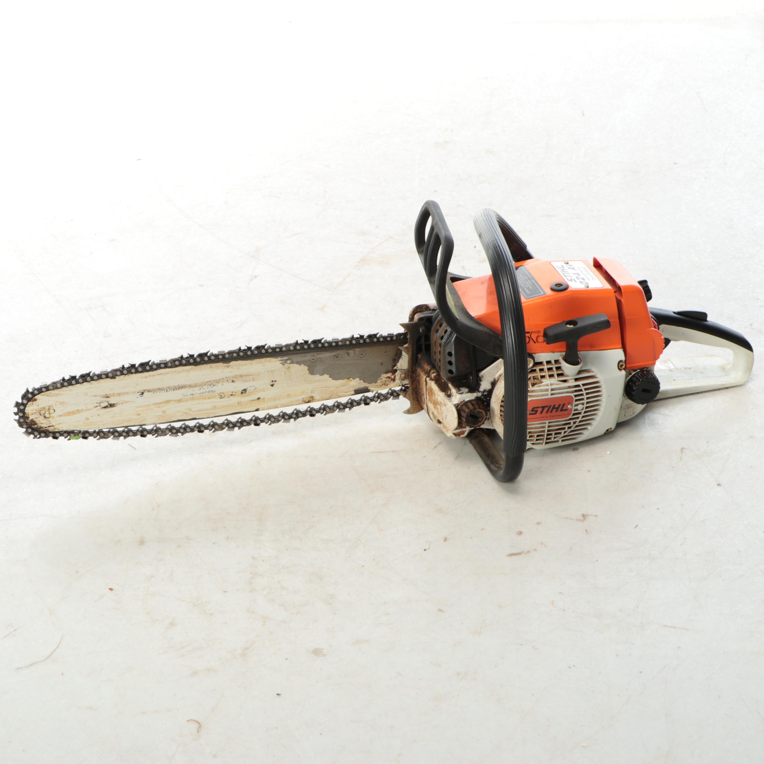STIHL Chainsaw and Jackson Wheelbarrow