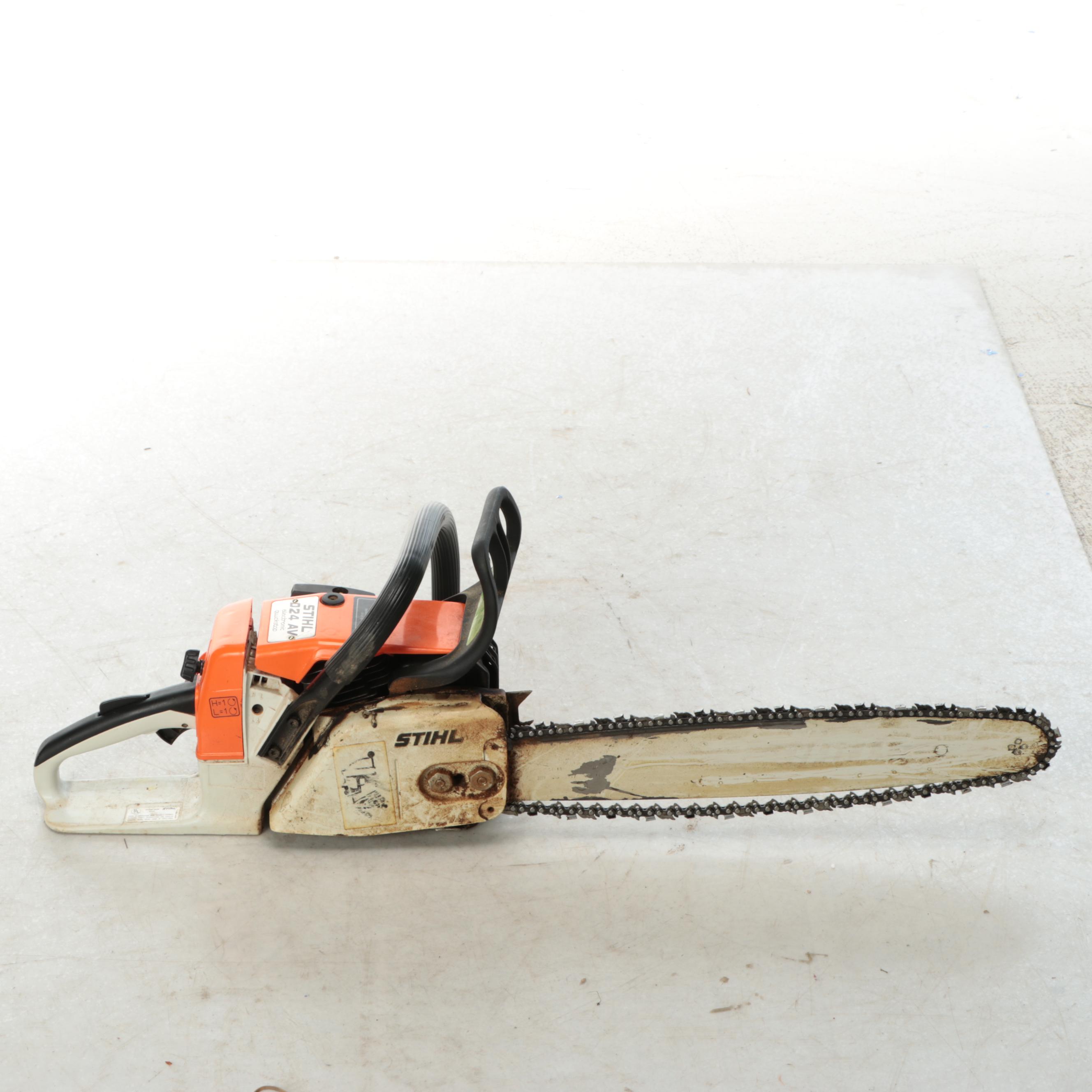 STIHL Chainsaw and Jackson Wheelbarrow