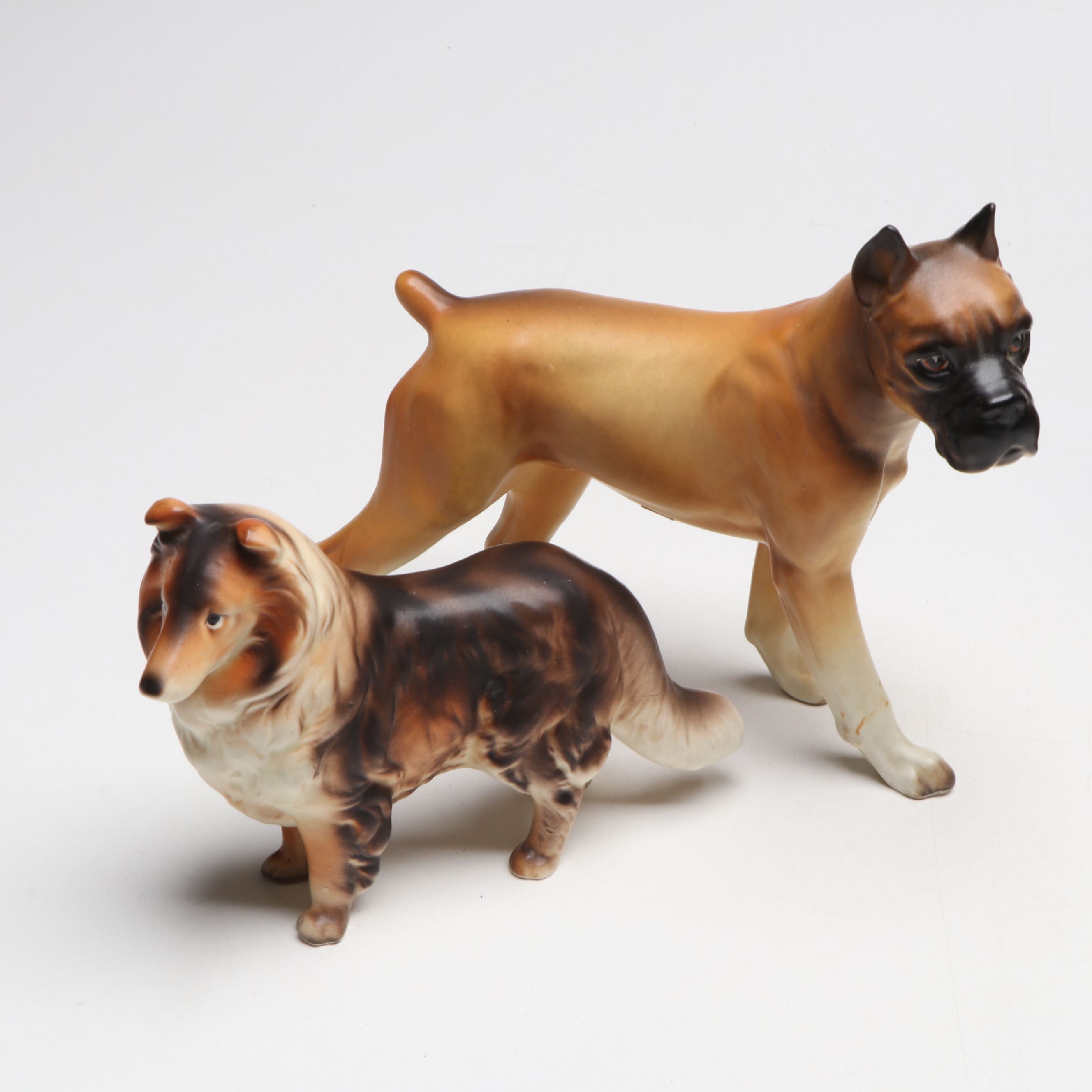 Brimm's and Other Porcelain Dogs with Carved Wooden Animals